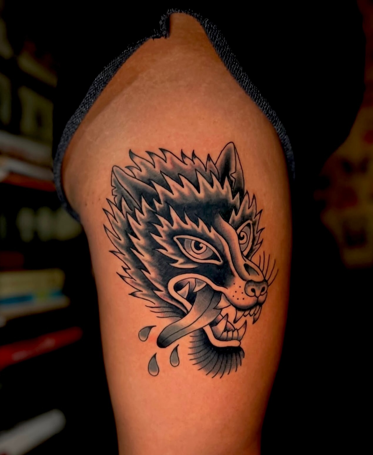 Wolf black and grey tattoo on the forearm by Dustie Pitstick