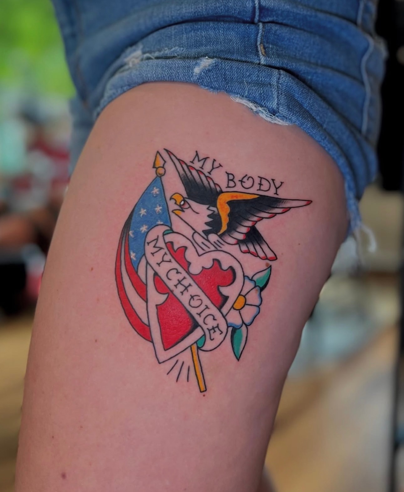 American flag eagle American traditional tattoo on the thigh by Dustie Pitstick