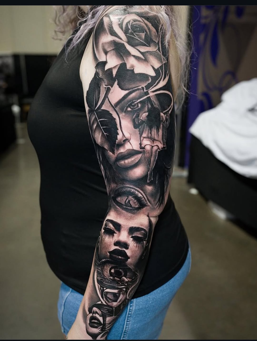 Surreal portrait sleeve realism tattoo on the forearm by Erick Satchell II