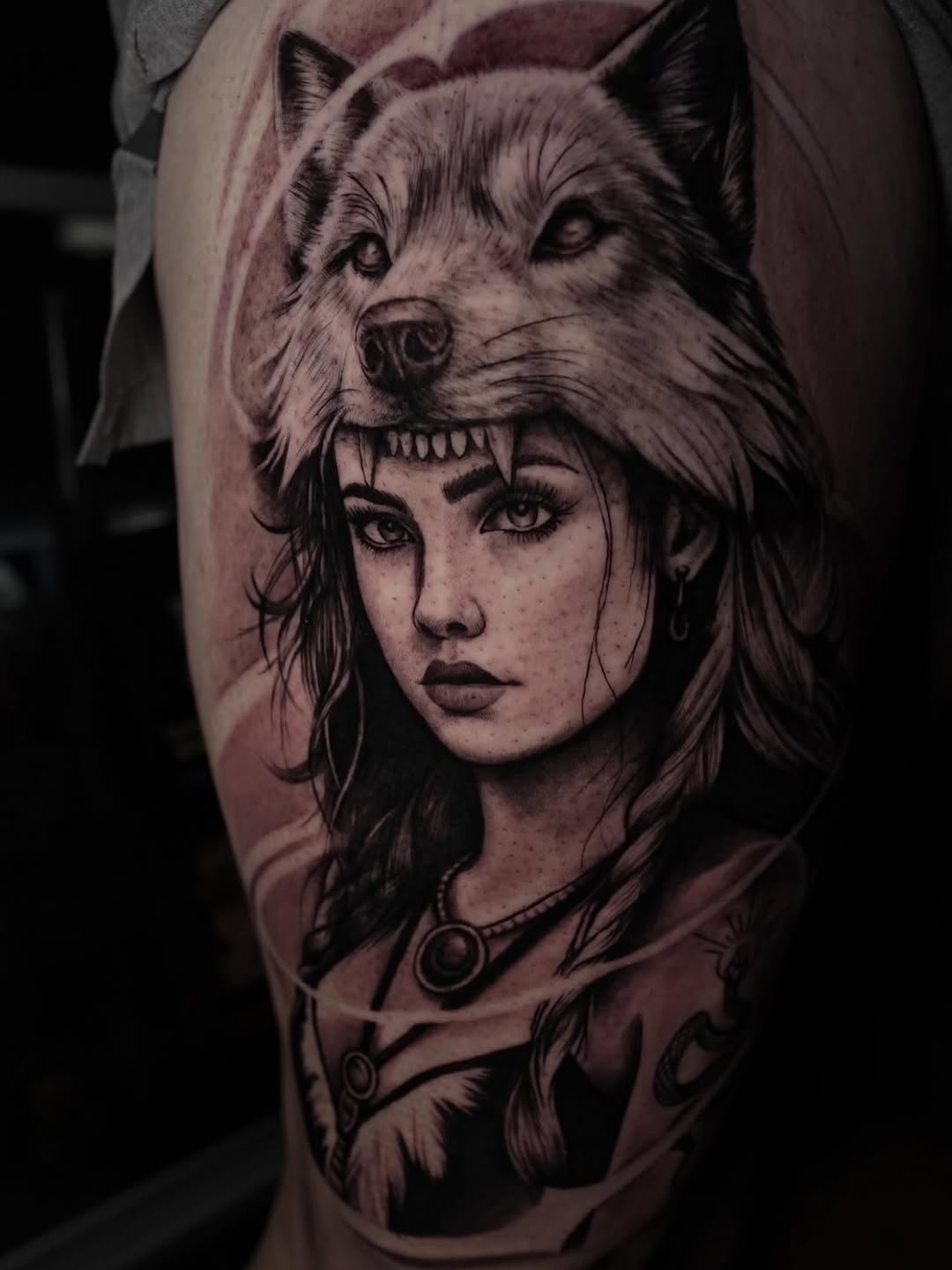 Woman with wolf headdress realism tattoo on the forearm by Erick Satchell II