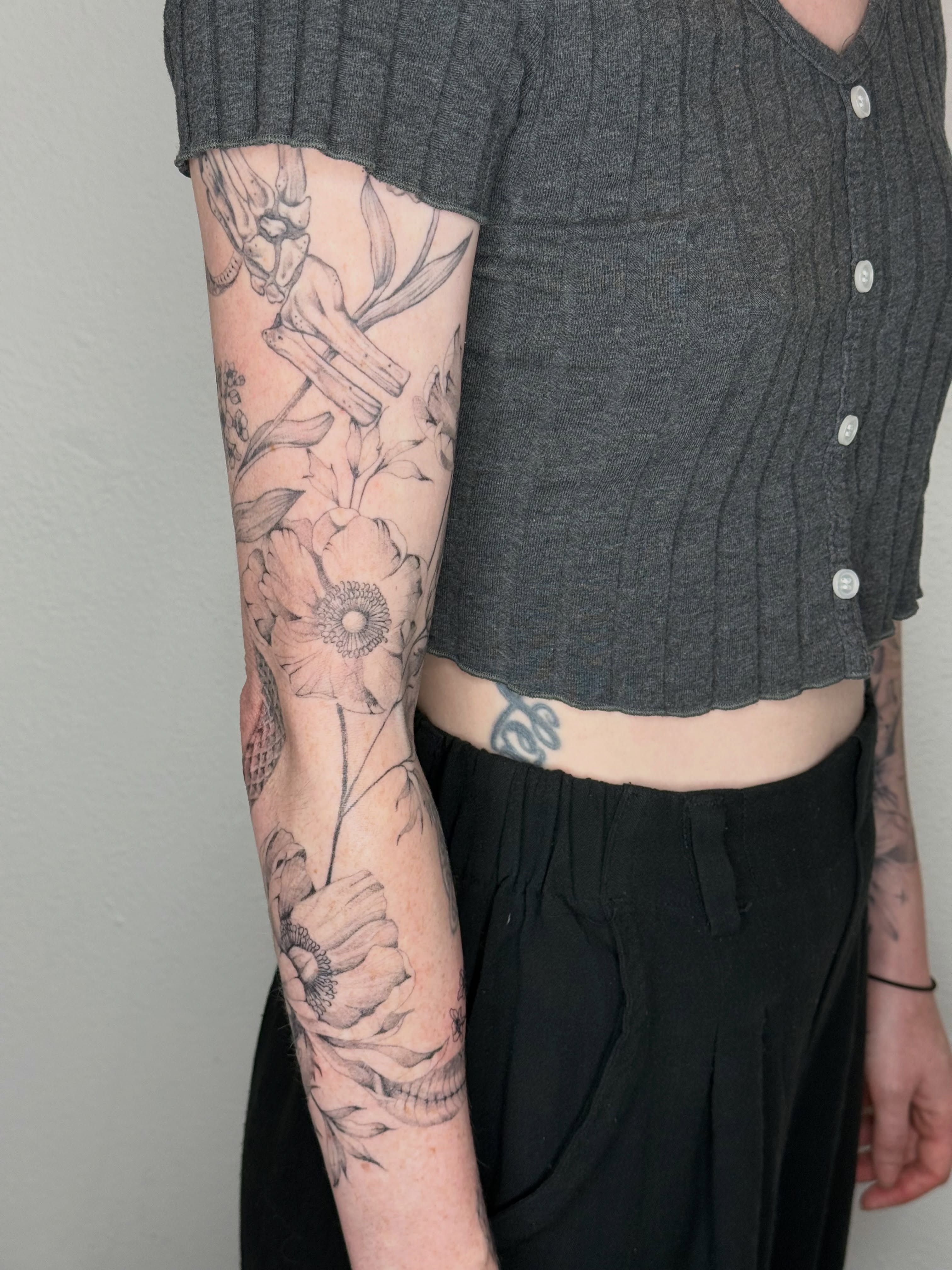Floral arrangement black and grey tattoo on the forearm by ❁ Marlo Marquise Tattoo Artist ❁