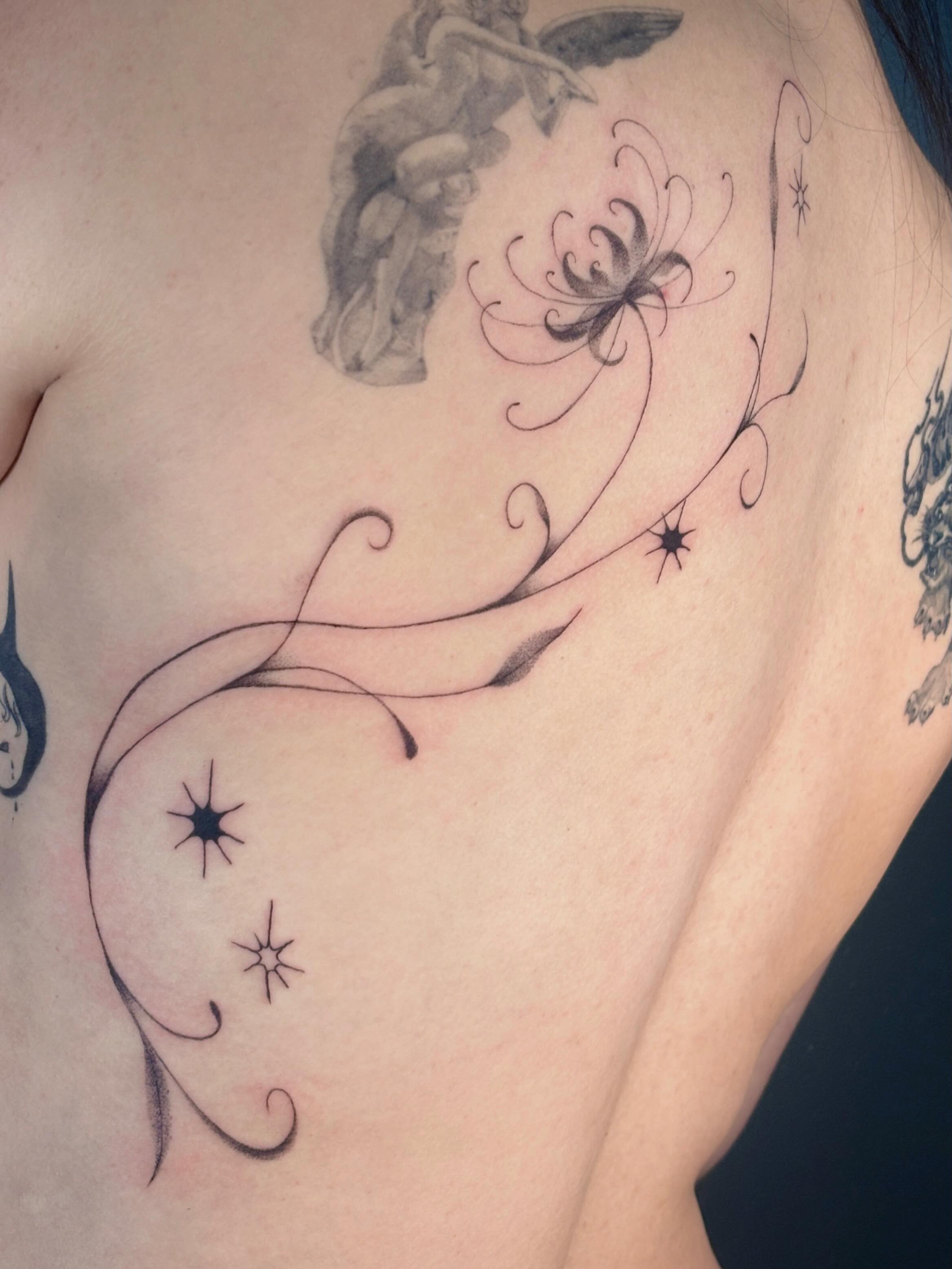 Floral swirls and stars fine line tattoo on the chest by ꜱʜɪʀʟᴇʏ