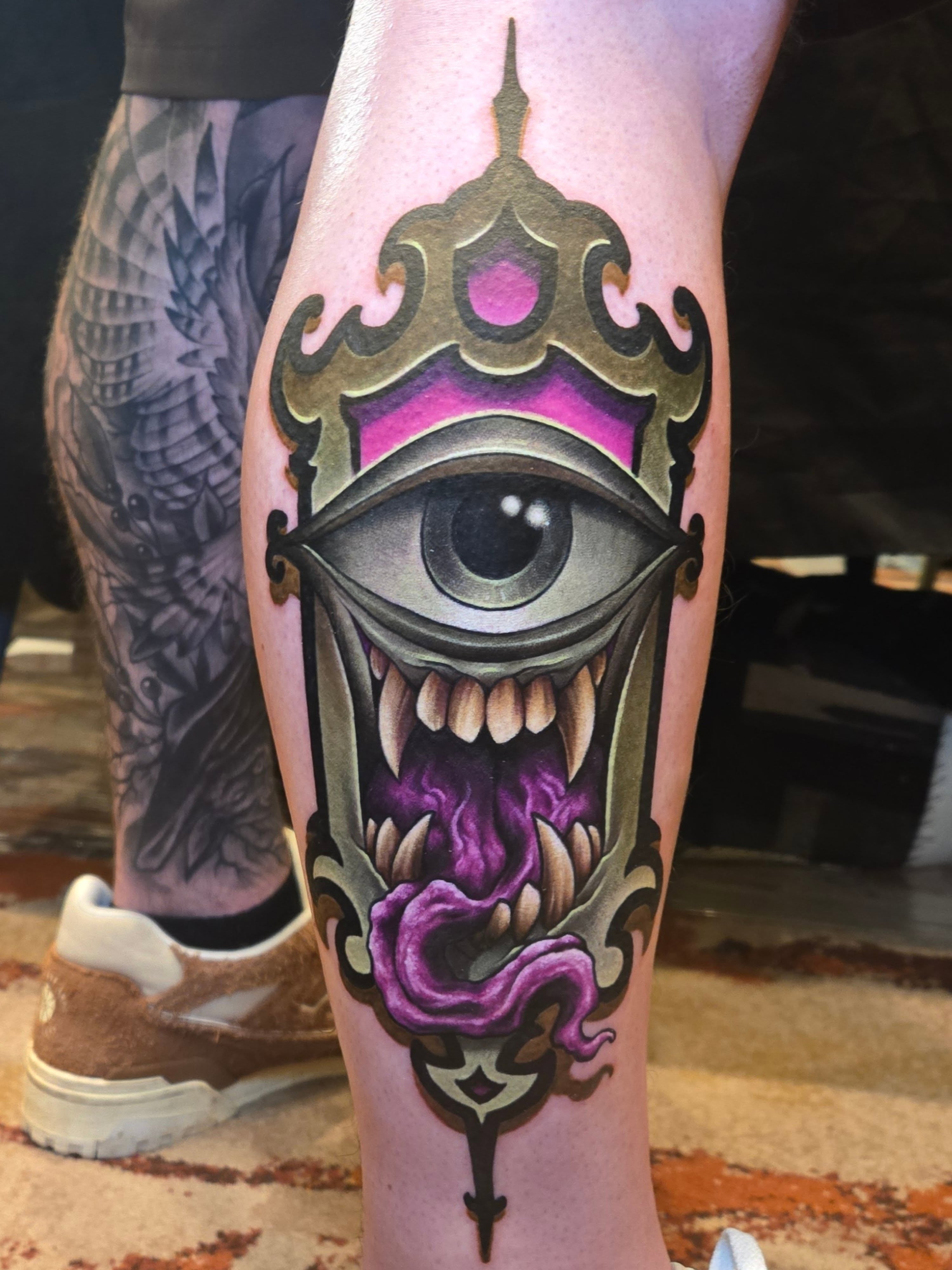 Eye with crown American traditional tattoo on the forearm by Jeff Stager