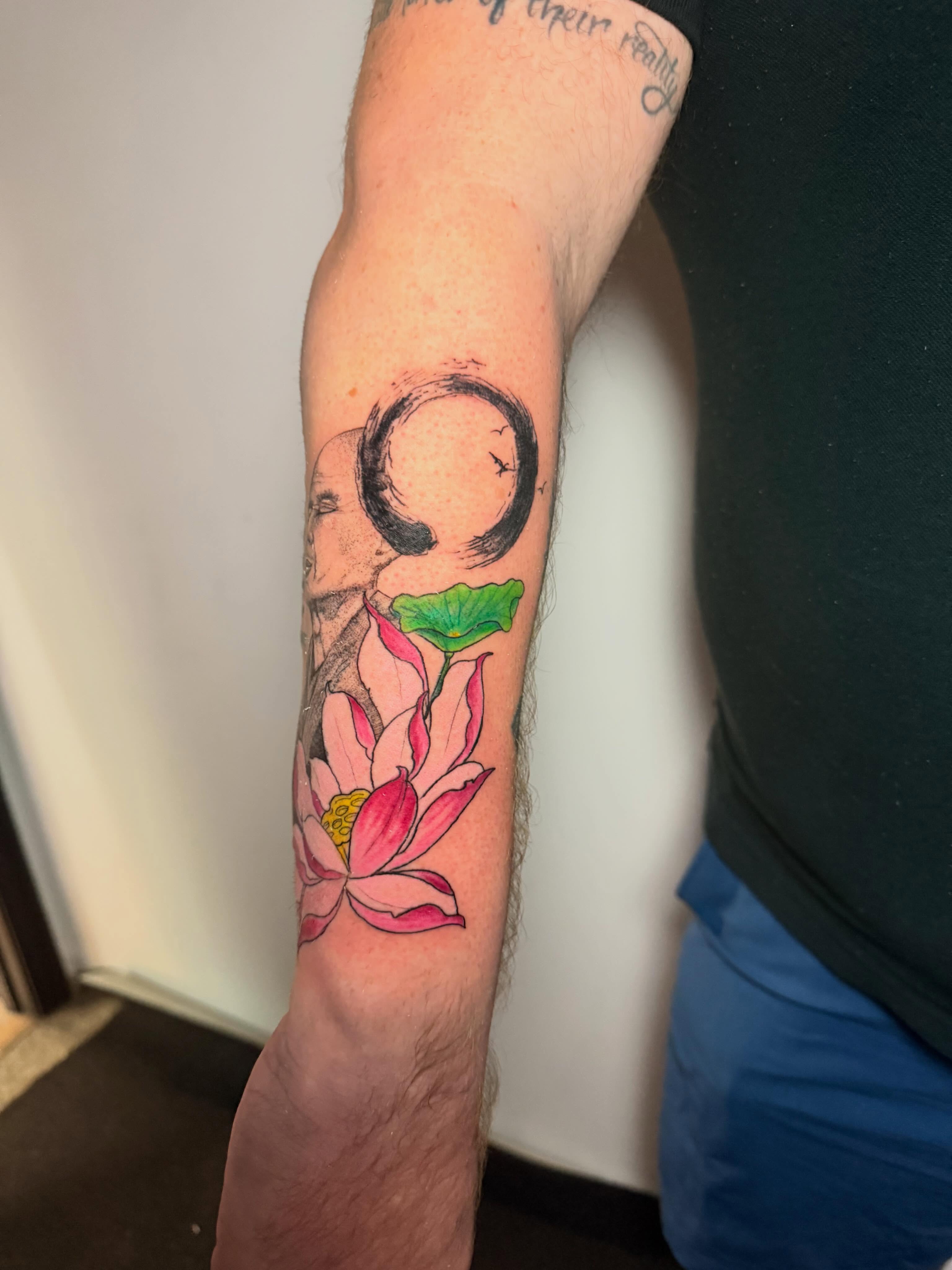 Lotus flower new school tattoo on the forearm by Gabrielle Frelak, York, Pennsylvania