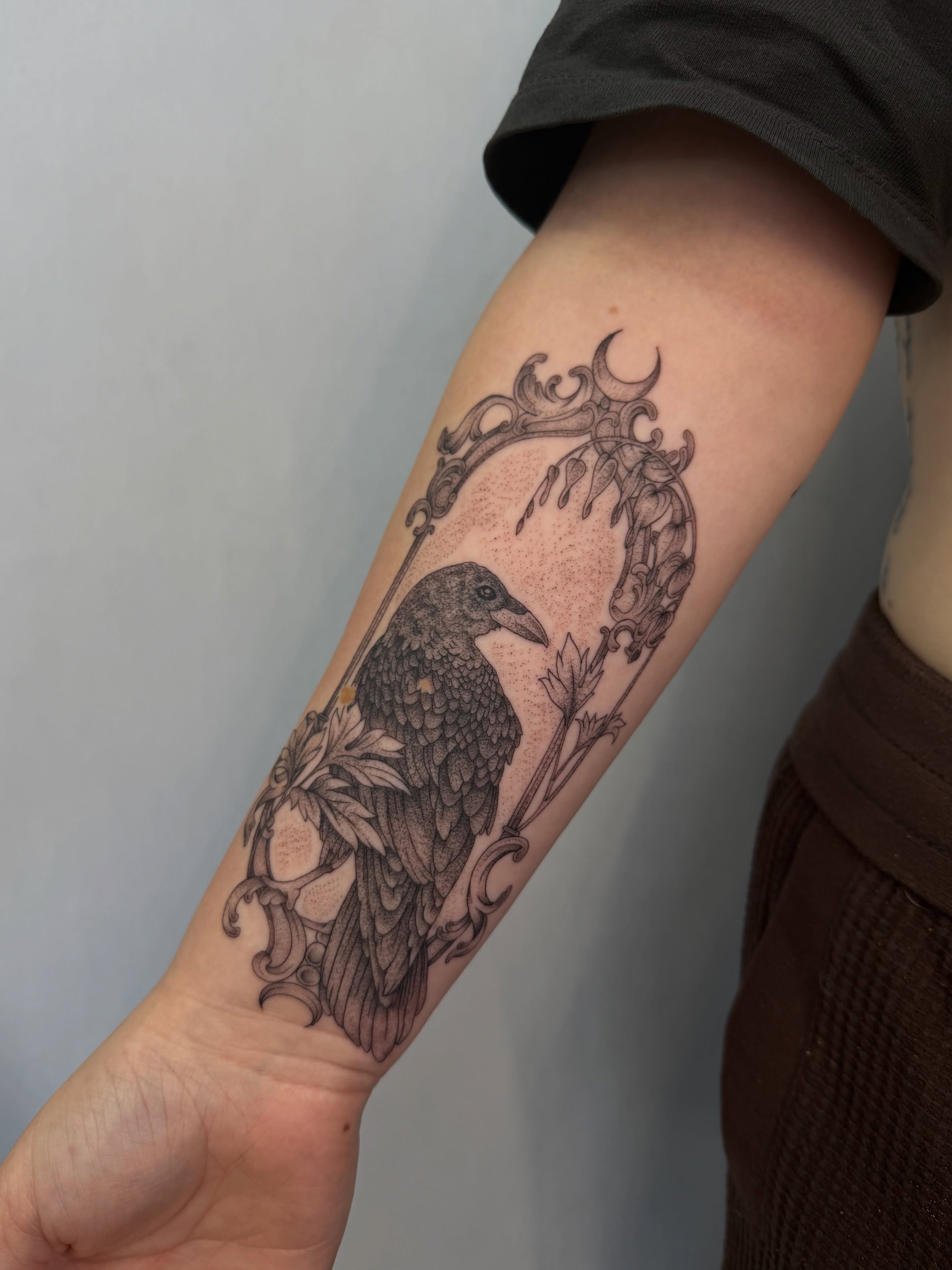 Crow realism tattoo on the forearm by Henesee Parfitt