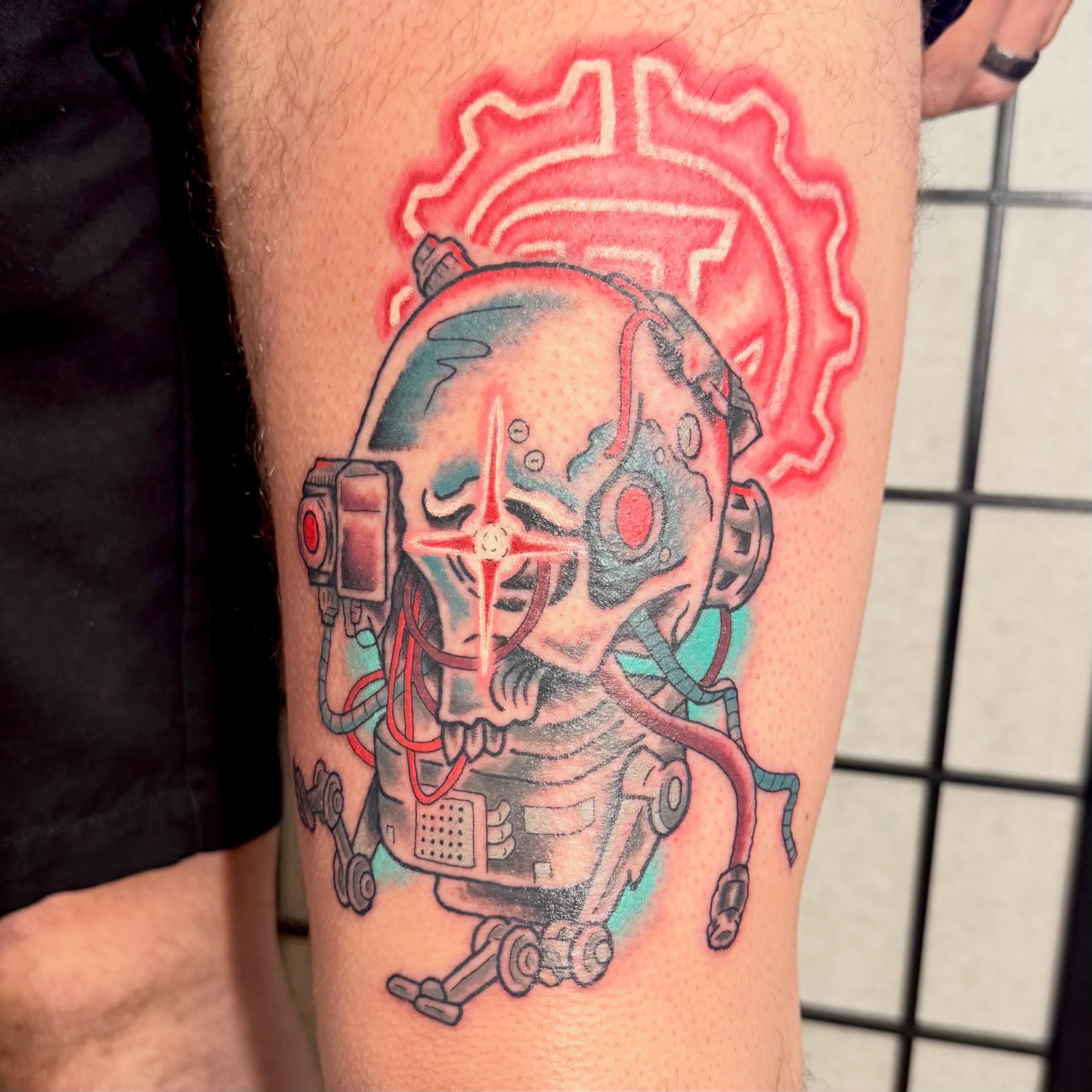 Cyborg skull geometric tattoo on the thigh by Zac Smith-Chevalier