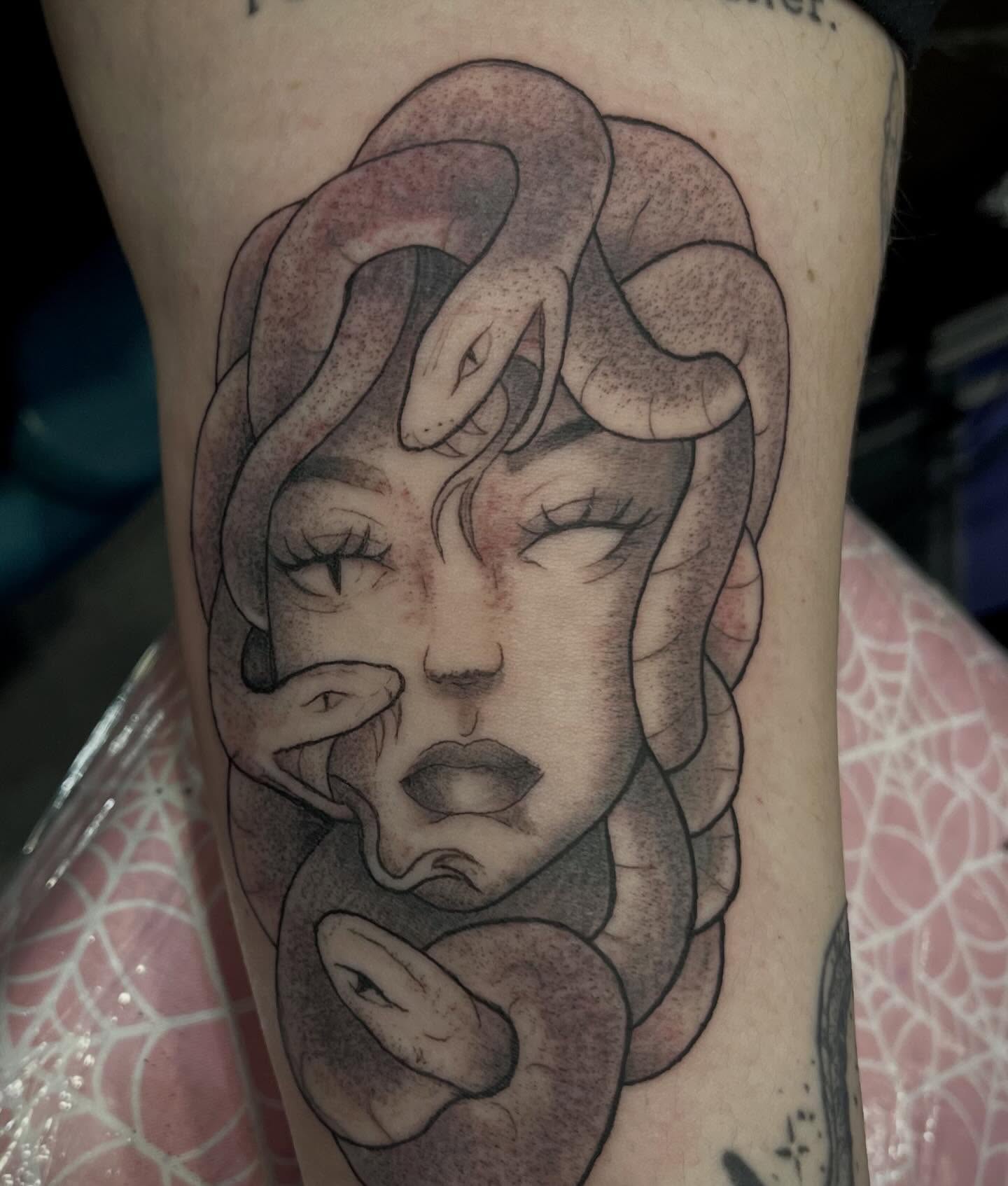 Woman with snakes realism tattoo on the forearm by Freya Petersen