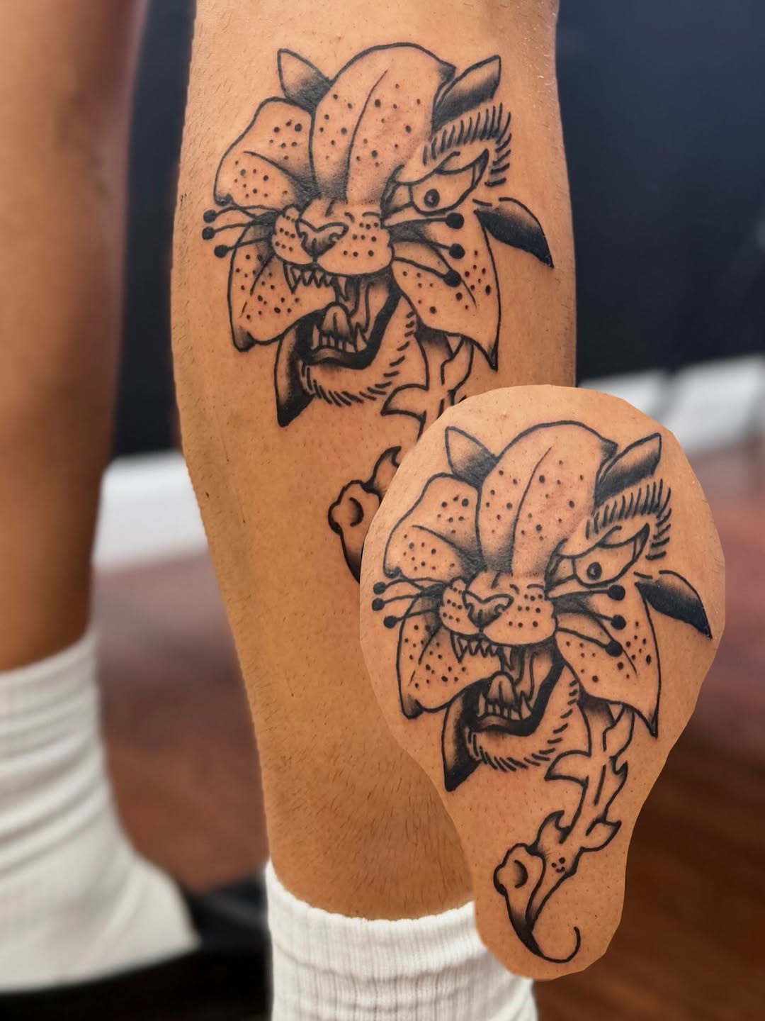 Panther head with flower elements realism tattoo on the forearm by ♱ C ♱, Dallas, Texas