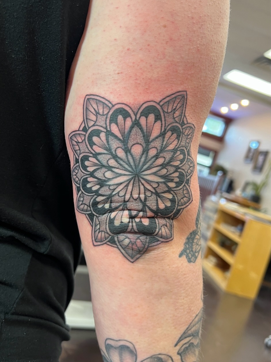 Tattoo by @lilylaurilatattoos — geometric, dotwork