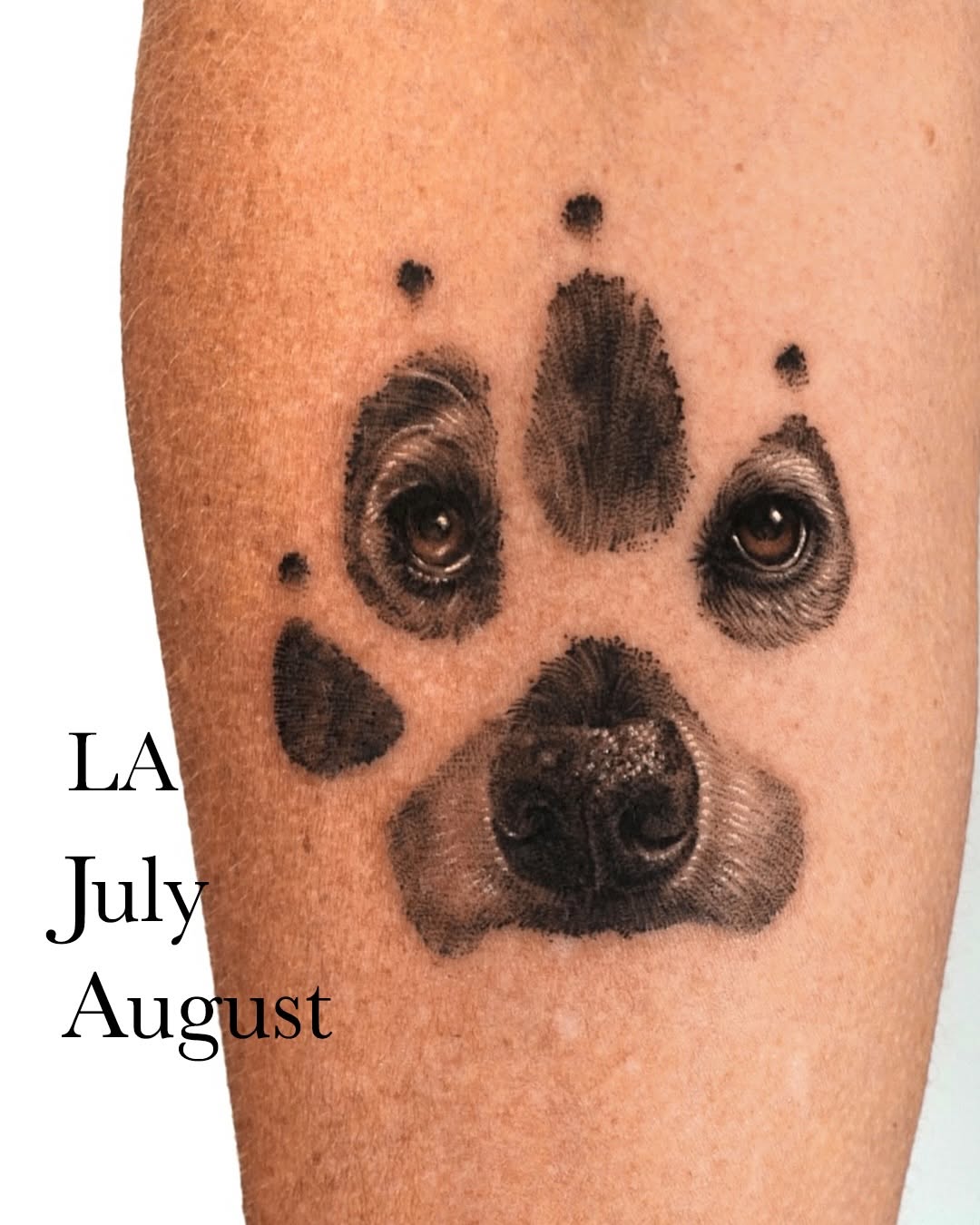 Dog paw print with face realism tattoo on the forearm by Ria Kim 김리아