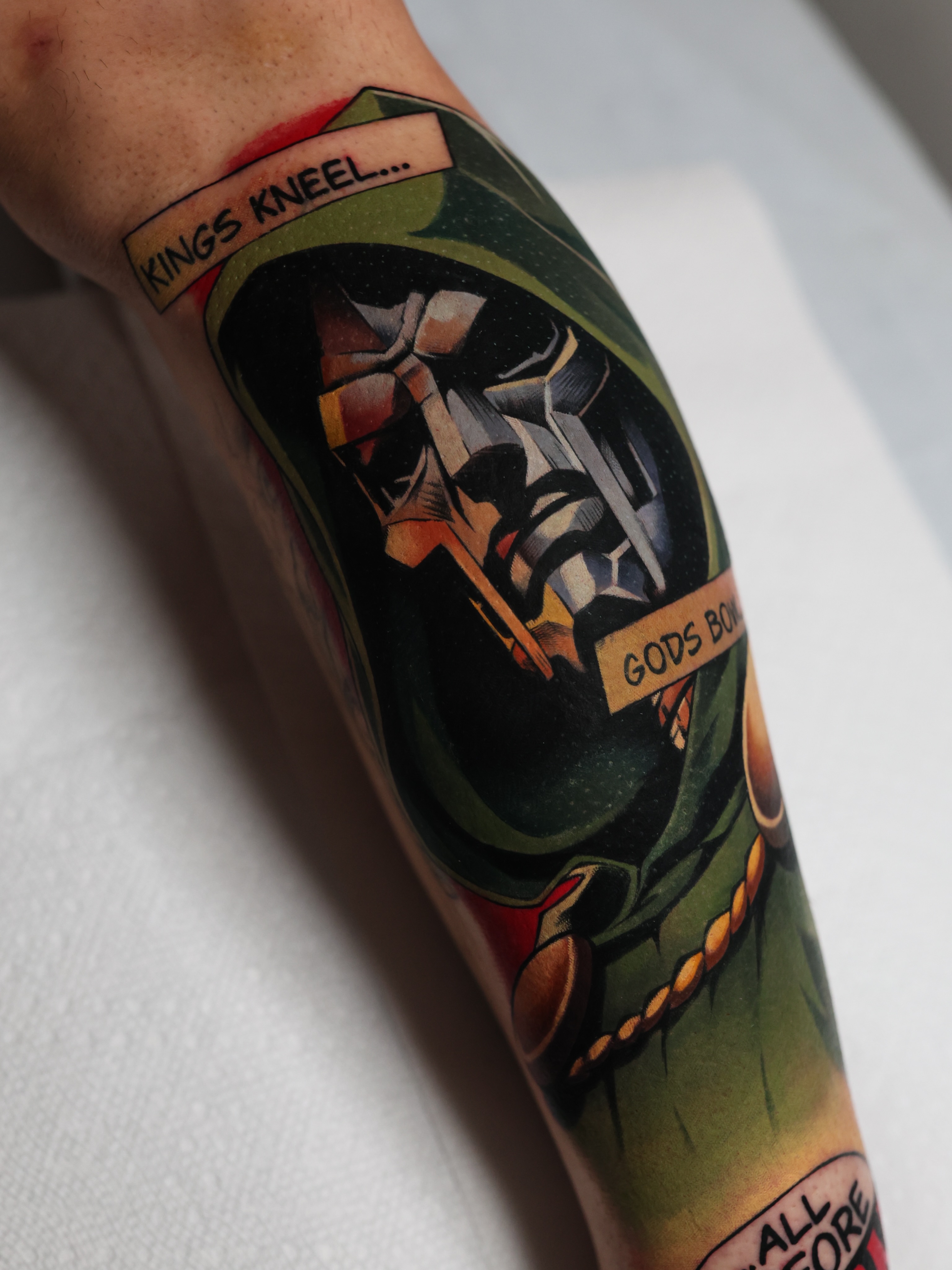 Cross and book American traditional tattoo on the forearm by Bee Rye