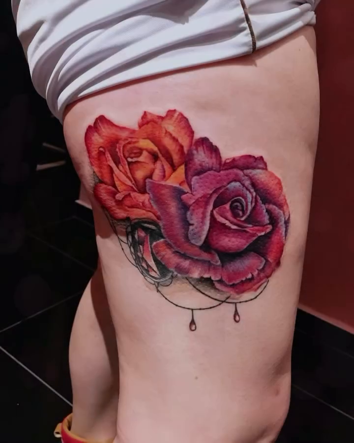 Roses neo-traditional tattoo on the thigh by Yana Aizen