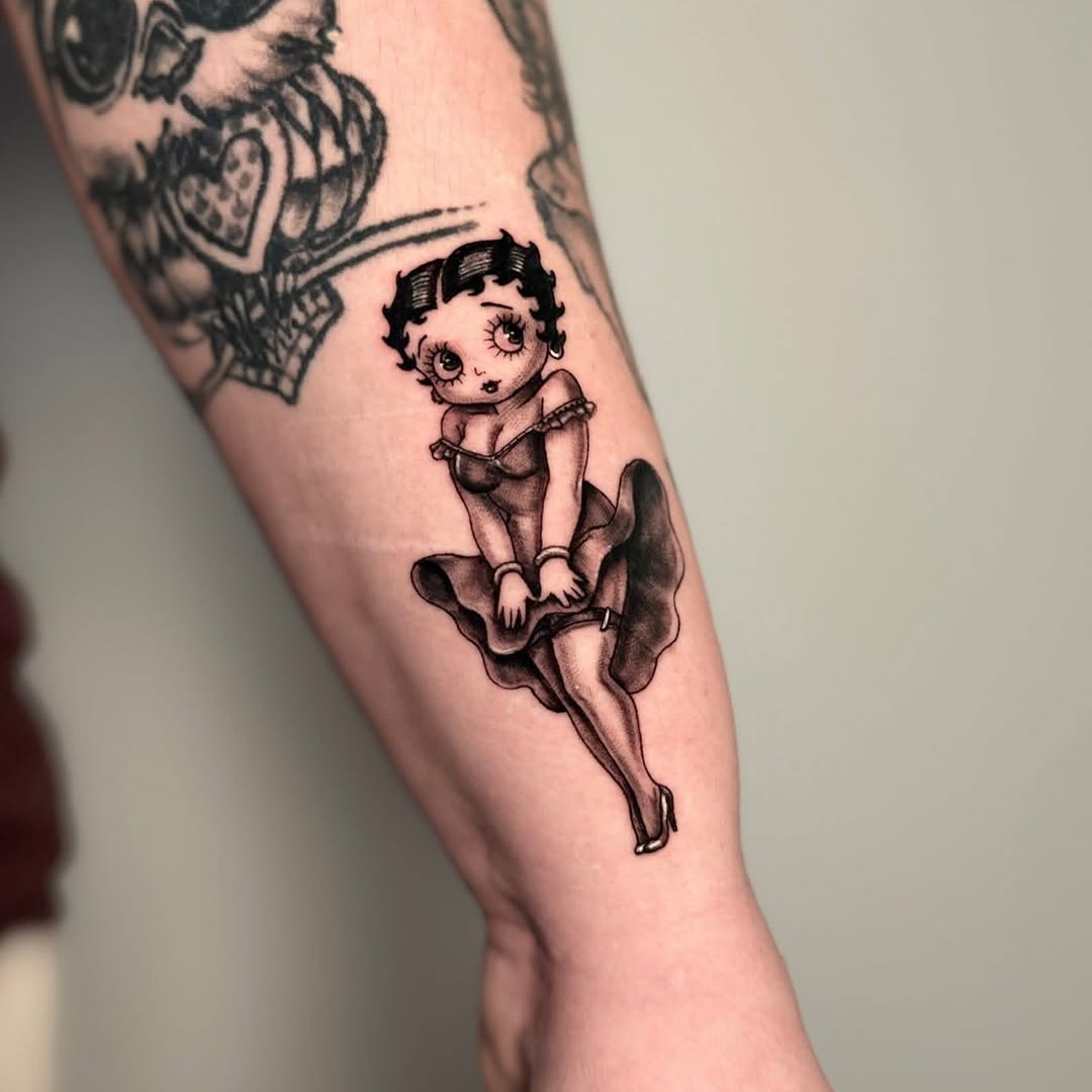 Betty Boop character neo-traditional tattoo on the forearm by Alex Cantor