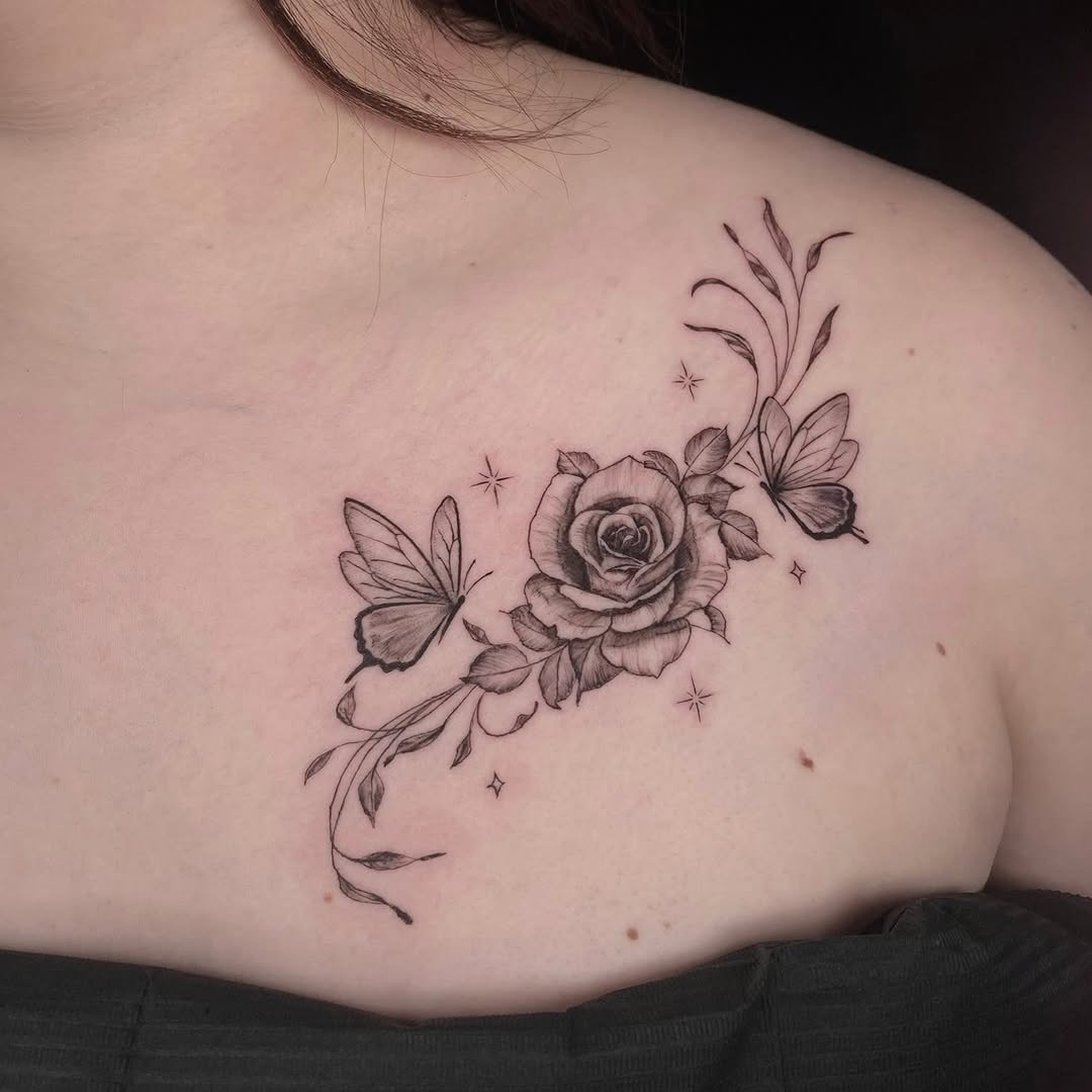 Rose and butterflies fine line tattoo on the shoulder by Alex Cantor