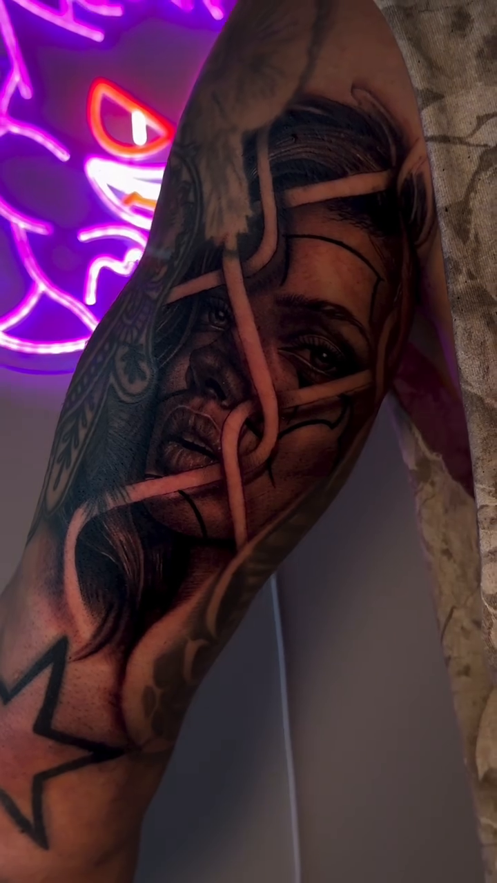 Portrait of a woman with chains realism tattoo on the forearm by Houston Tattoo Artist