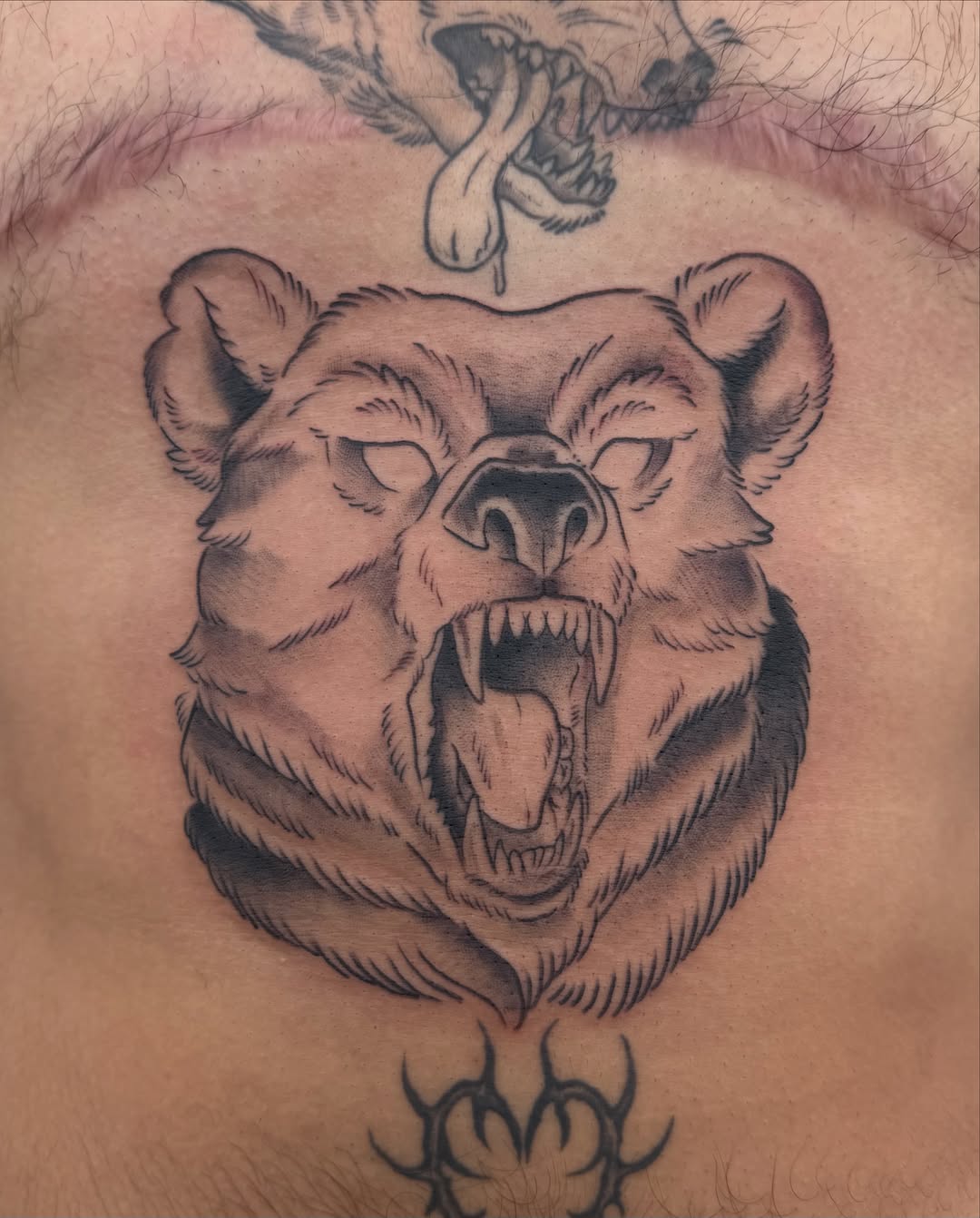 Bear black and grey tattoo on the chest by Roswell Orellana 👽🛸