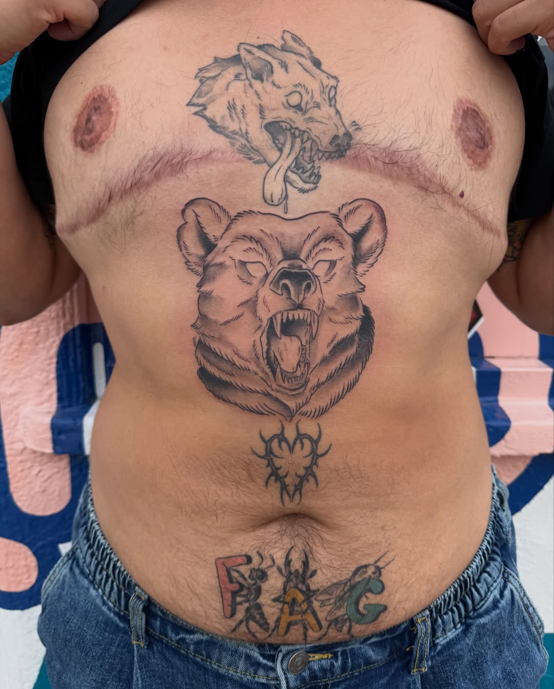 Bear and wolf black and grey tattoo on the chest by Roswell Orellana 👽🛸