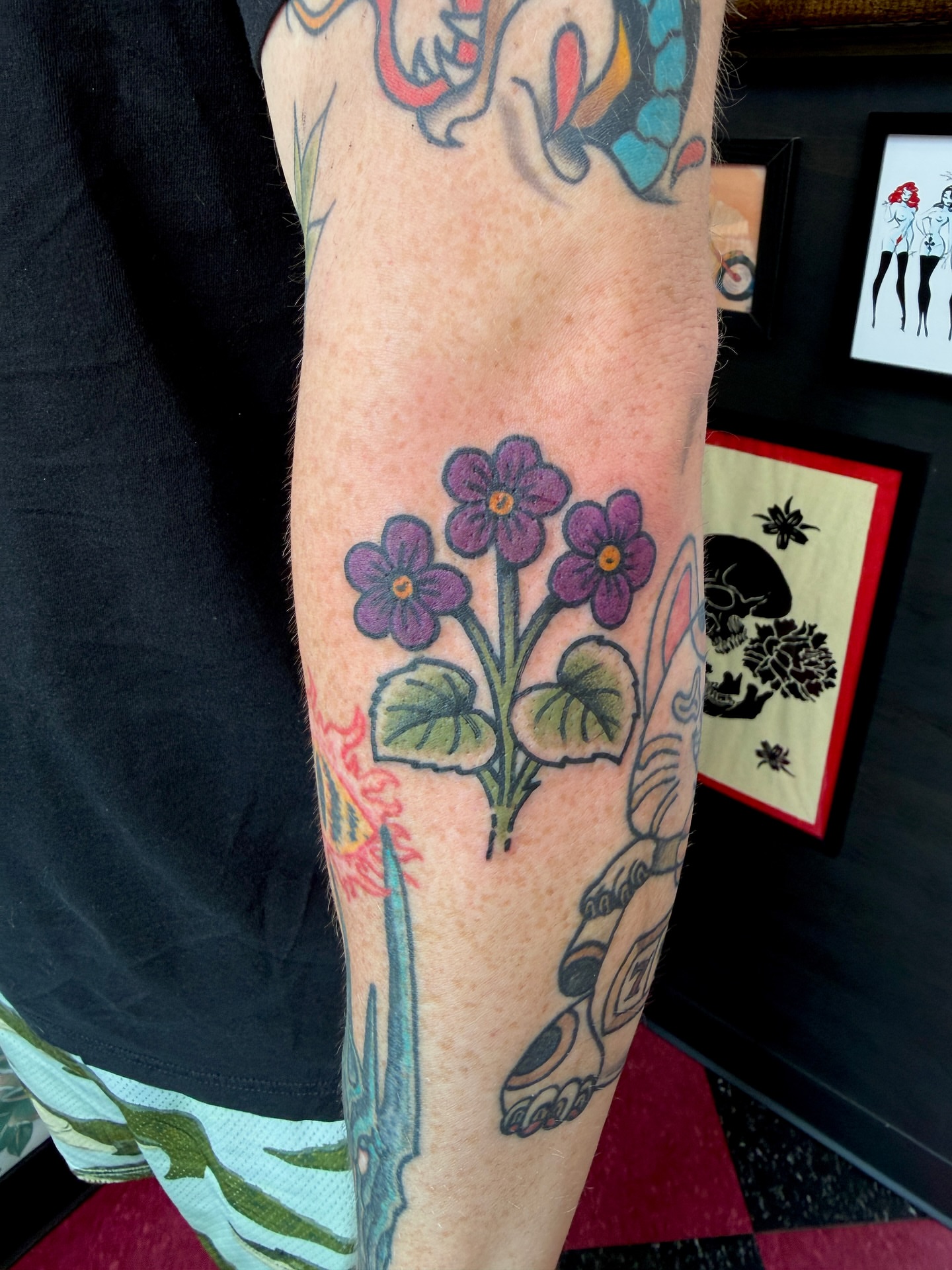 Purple flowers American traditional tattoo on the forearm by Patrick Miller, Huber Heights, Ohio