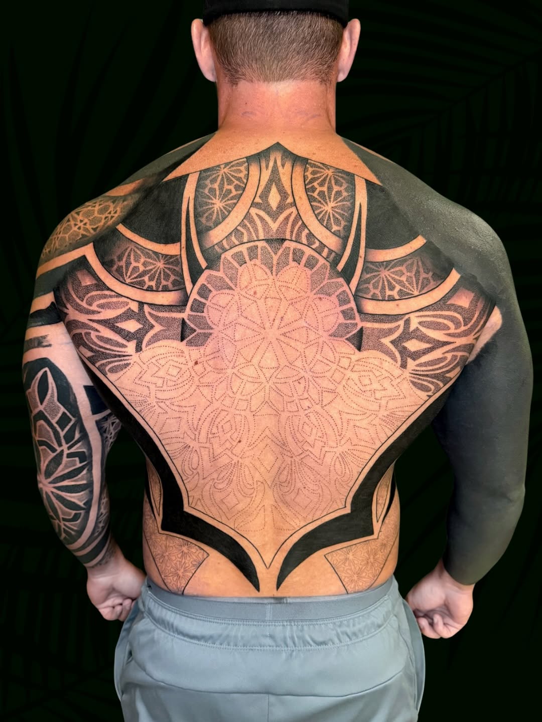 Geometric back piece geometric tattoo on the back by Sarah Margaret