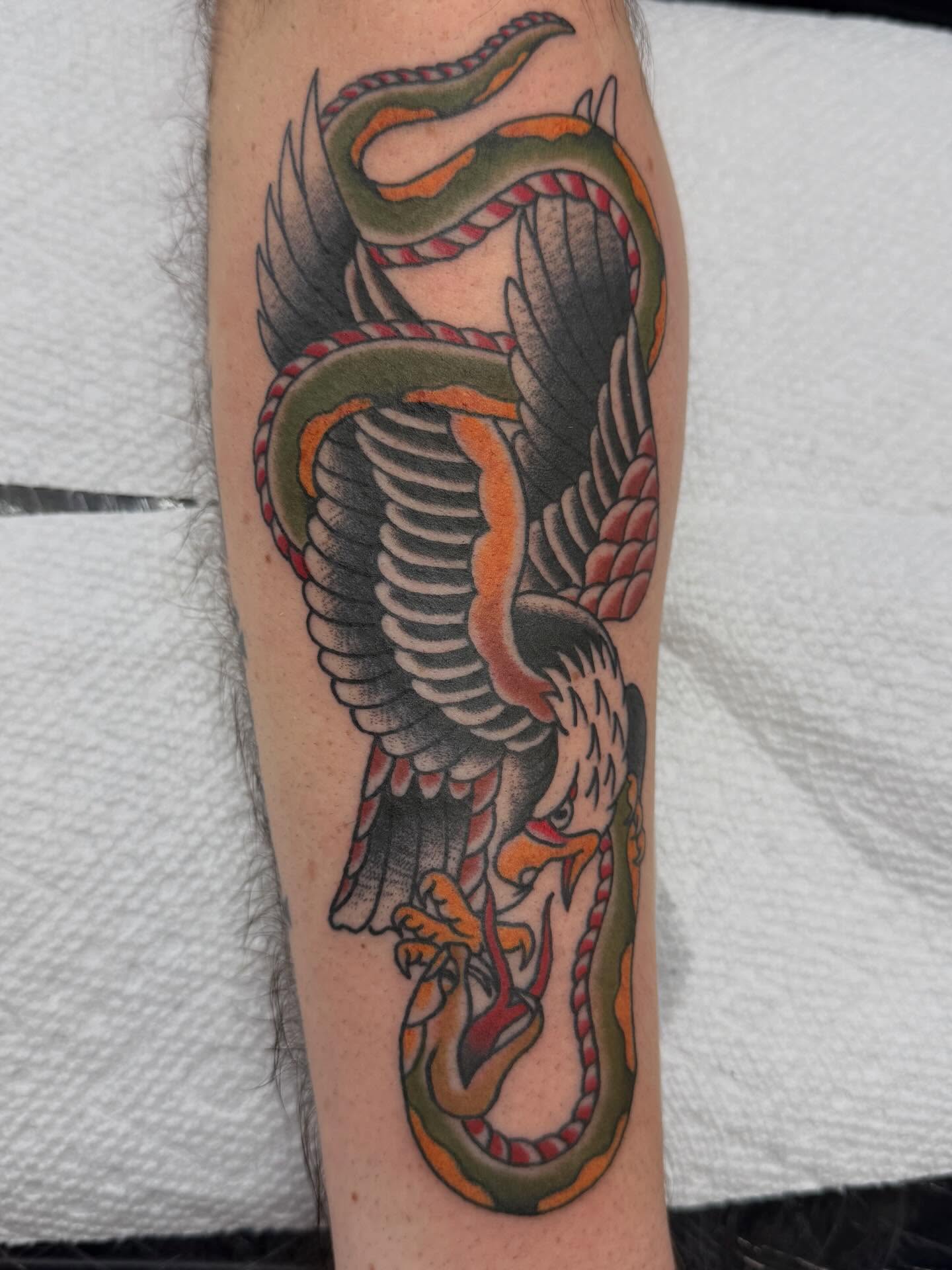 Dragon American traditional tattoo on the forearm by Trent Parsley