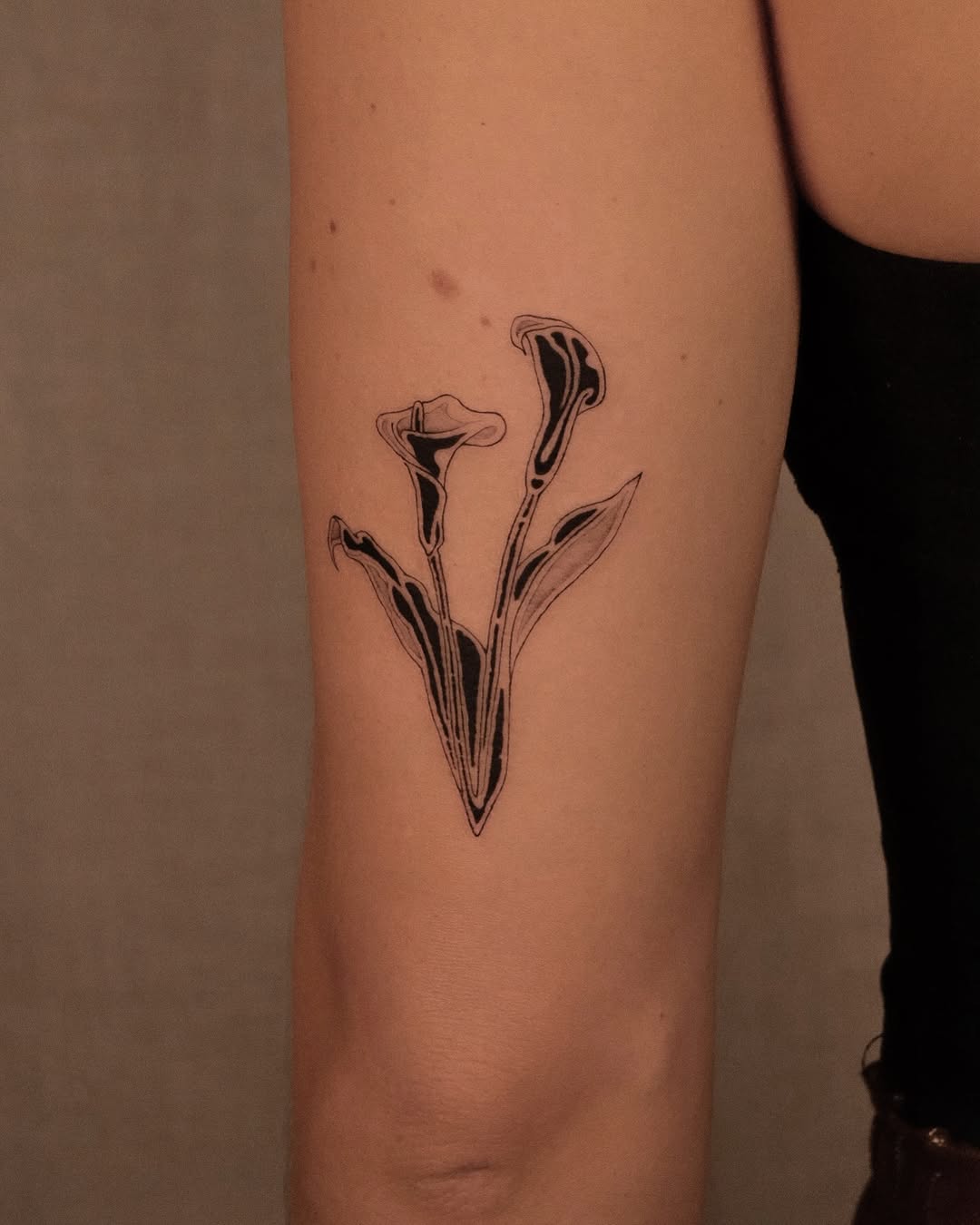 Calla lilies fine line tattoo on the forearm by ❖ Tomi ❖