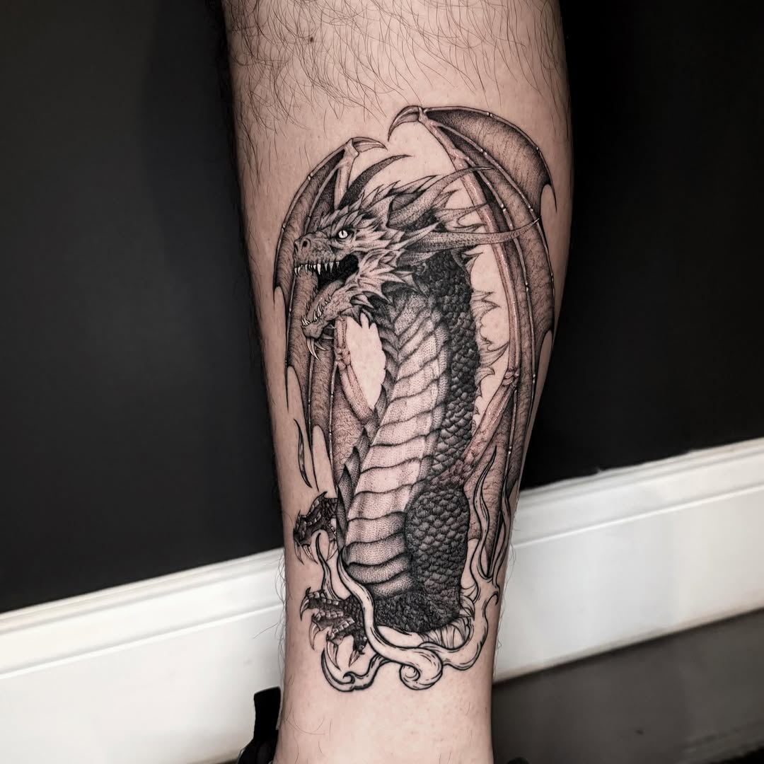 Dragon realism tattoo on the calf by Amanda