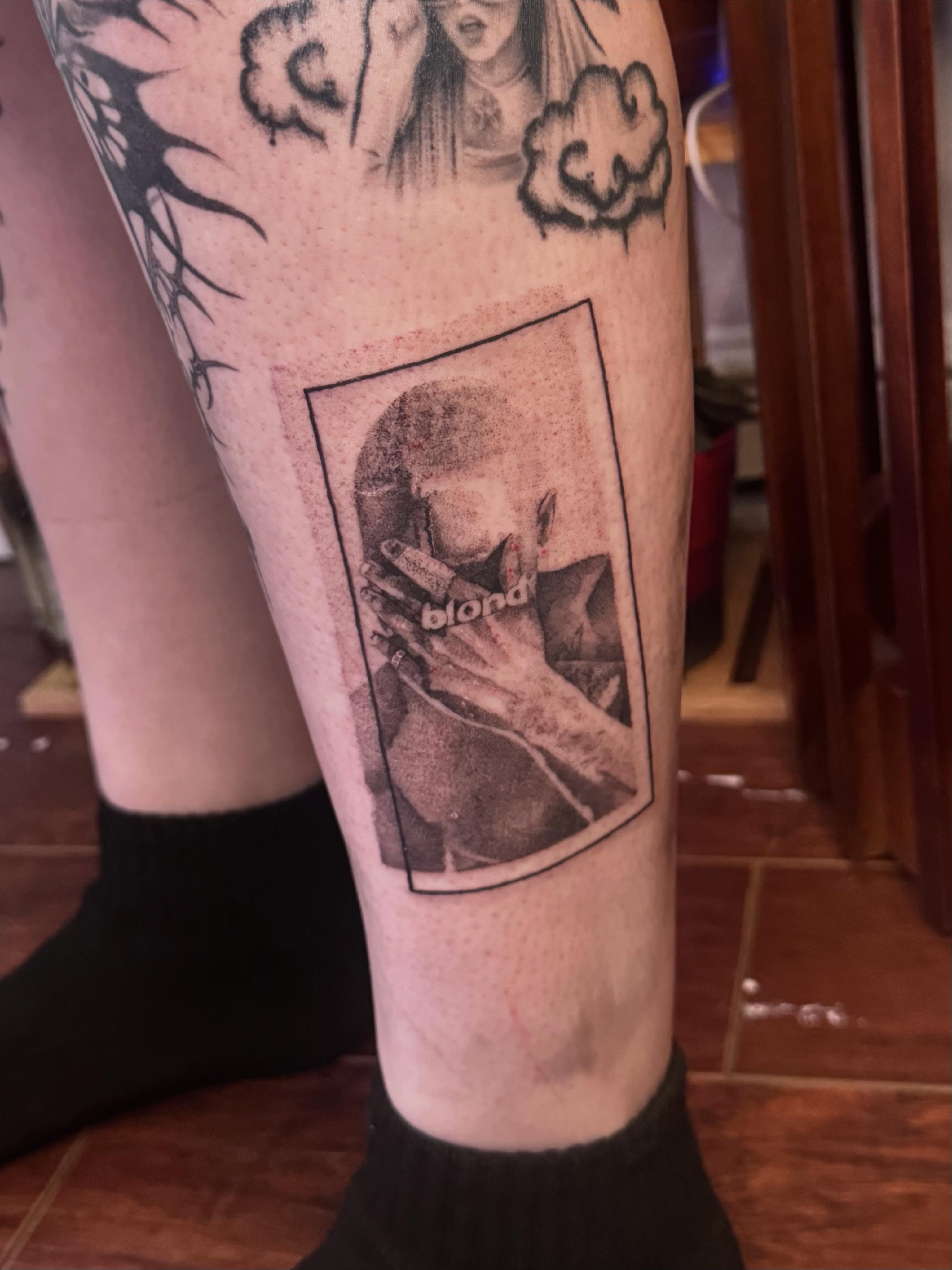 Photograph dotwork tattoo on the calf by Nat🫧