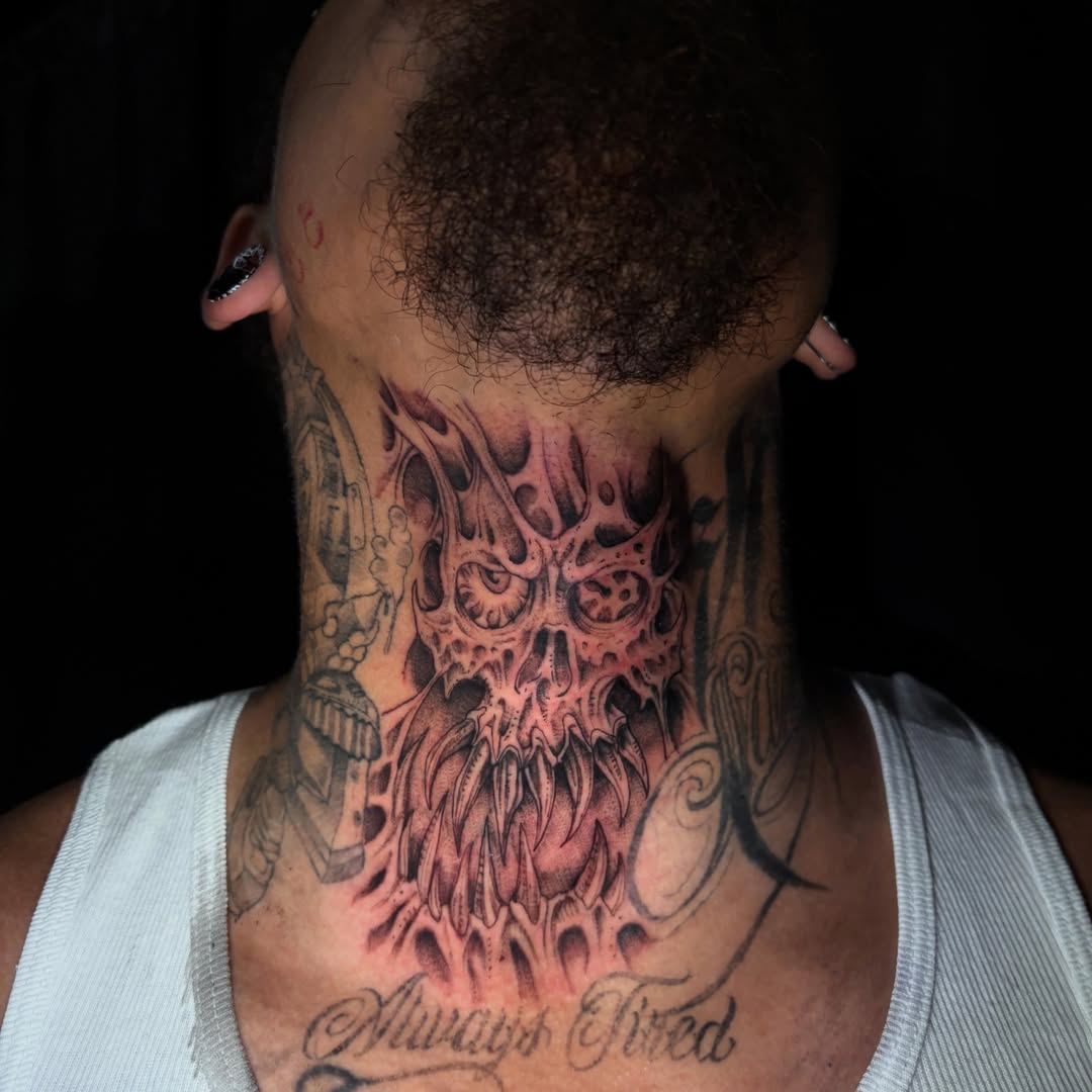 Skull dark realism tattoo on the neck by Crawlspacecadet