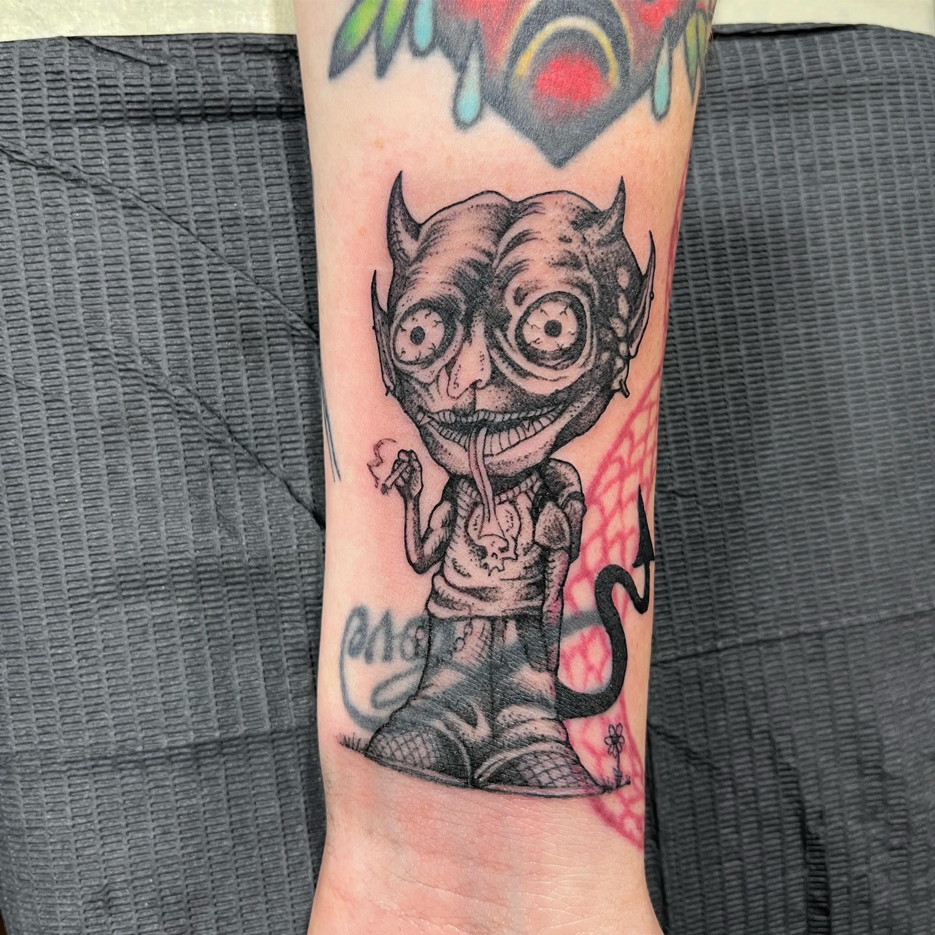 Demon-like creature realism tattoo on the forearm by Crawlspacecadet