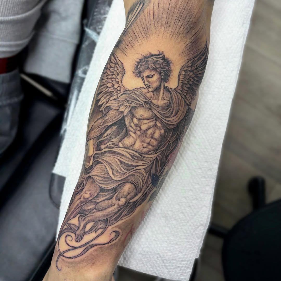 Angelic figure realism tattoo on the forearm by Dallas Tattoo Artist