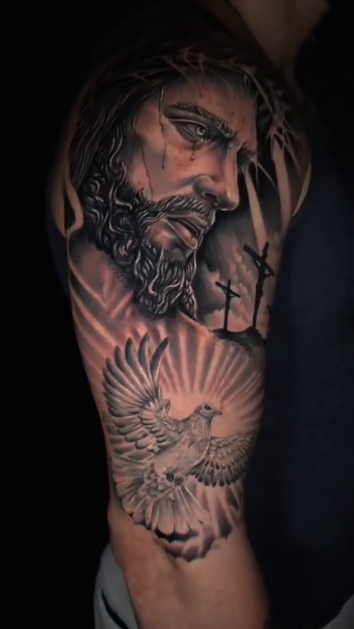 Jesus Christ with dove and crosses realism tattoo on the upper arm by 𝐍𝐄𝐗'𝐒 𝐈𝐍𝐊 🇨🇺, Tampa