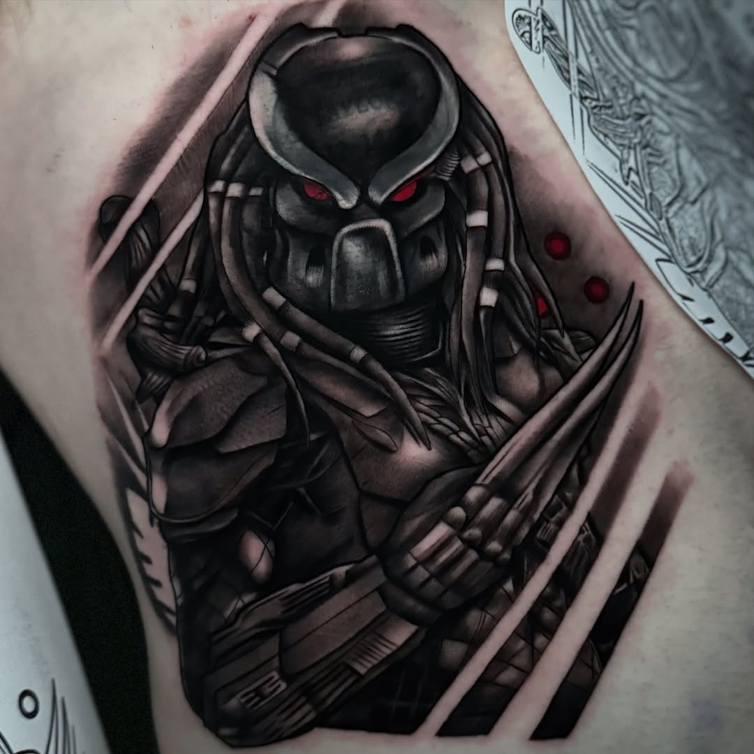 Predator character realism tattoo on the chest by Jaxx Kesler