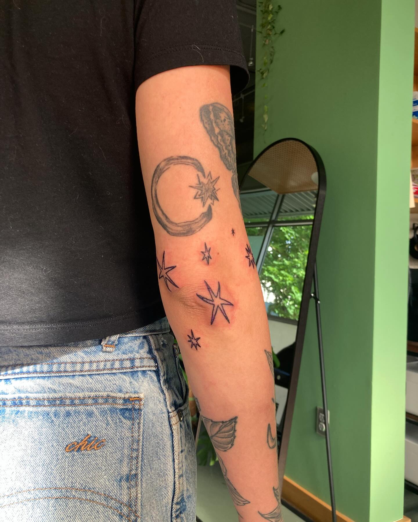 Moon and stars black and grey tattoo on the forearm by james <3