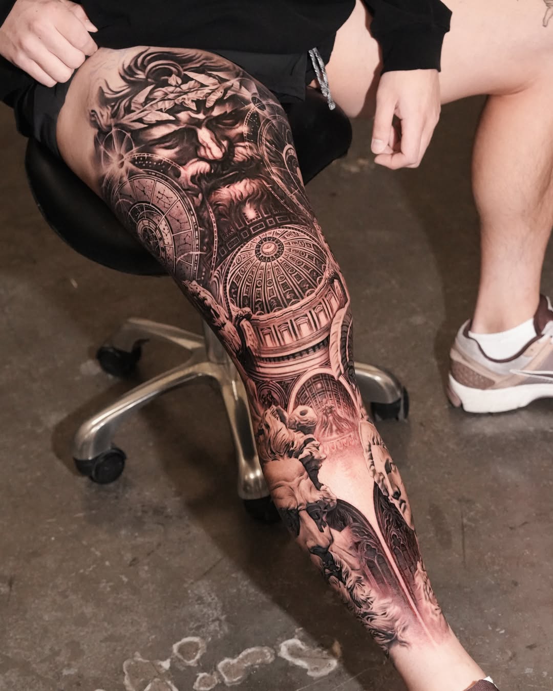 Classical architecture and portrait surrealism tattoo on the leg by Gody
