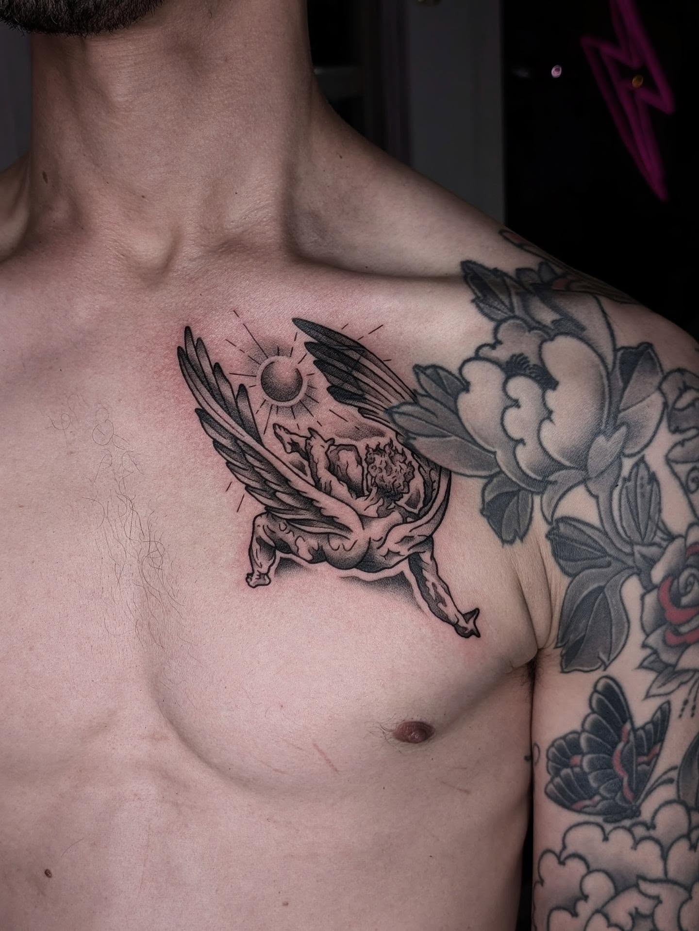 Angel with wings American traditional tattoo on the chest by ᴇʟɪsᴇ