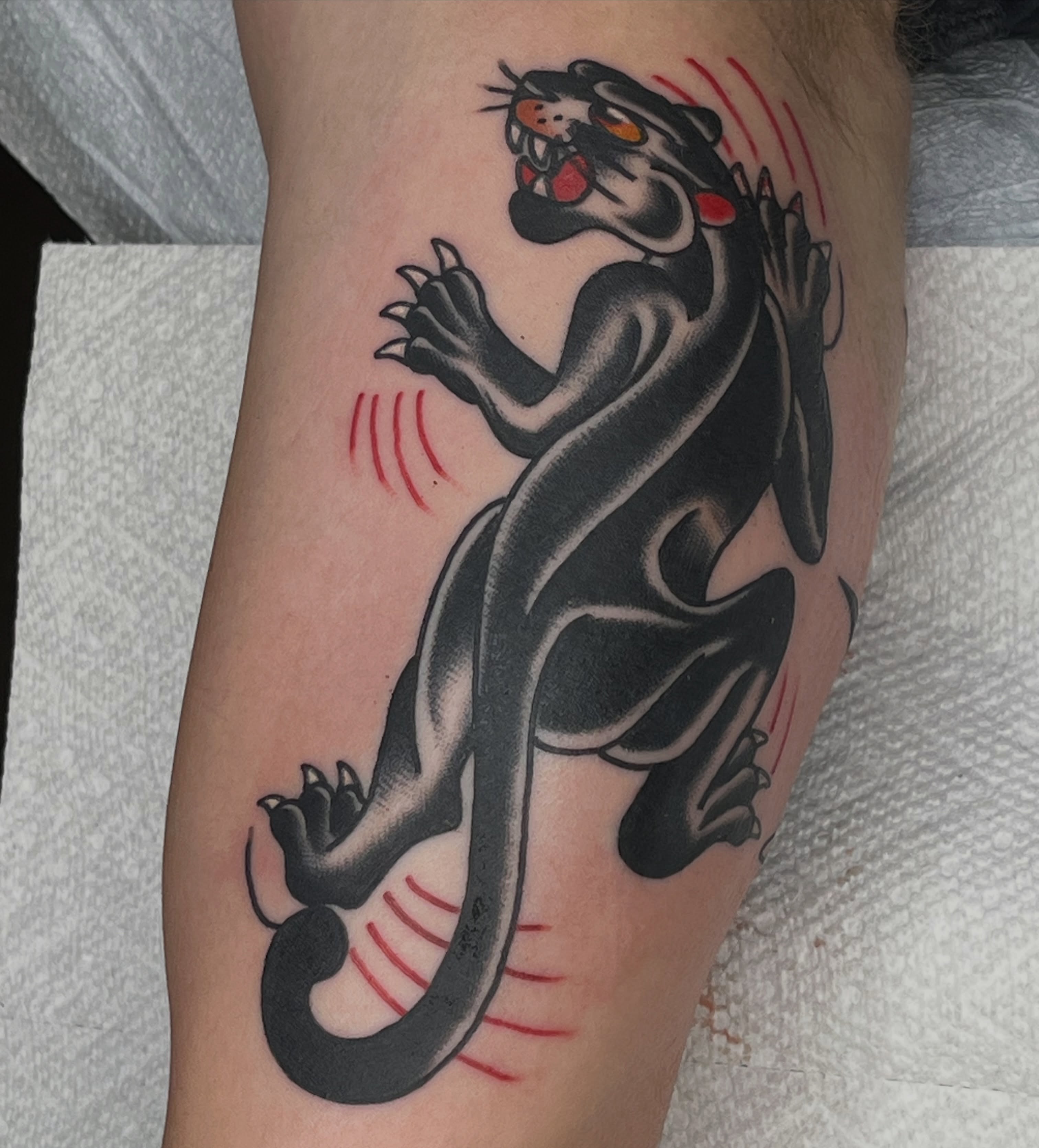 Panther American traditional tattoo on the forearm by Alex Ratliff