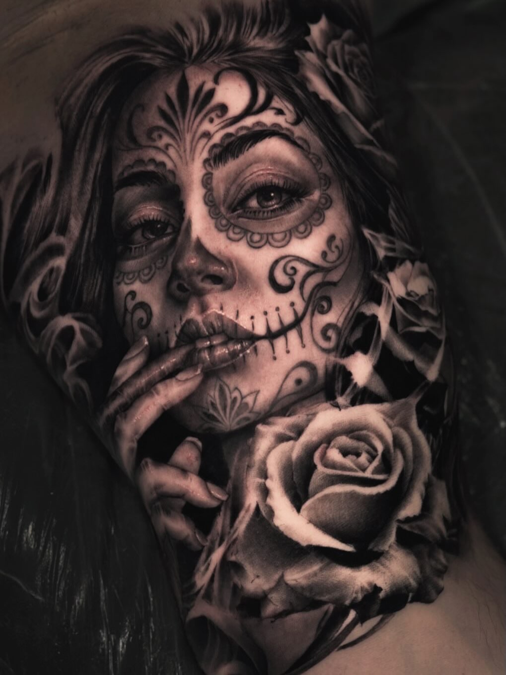 Sugar skull woman with roses realism tattoo by Pitasso tattoo black and grey