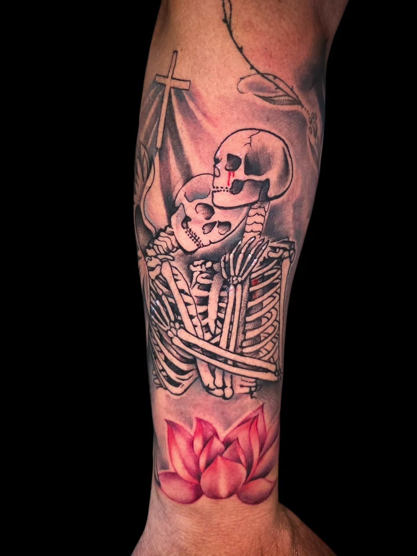 Skeleton with lotus realism tattoo on the forearm by Matriix.Ink Tattoos, Groton, Connecticut