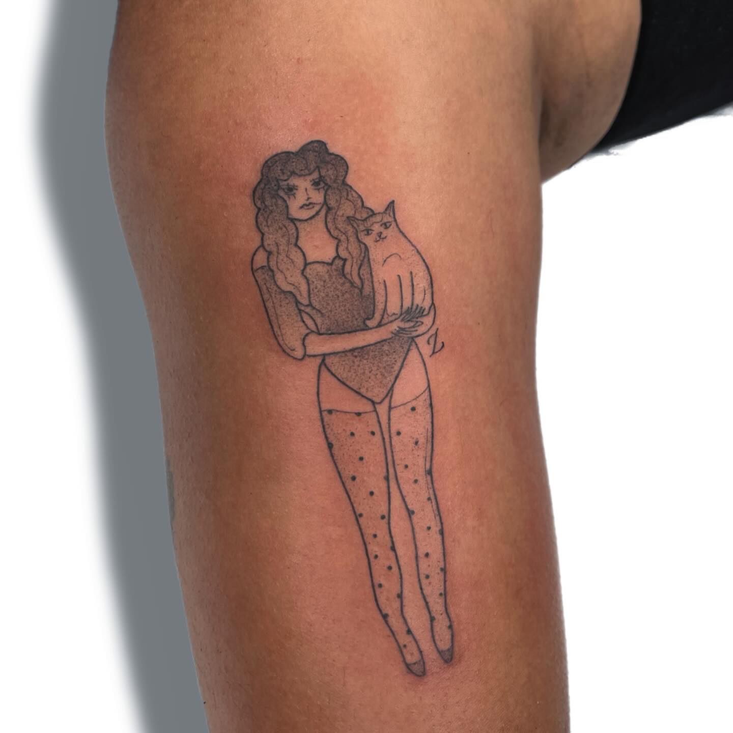 Woman holding cat dotwork tattoo on the thigh by Jules ๐โโฌ, Chicago, Illinois