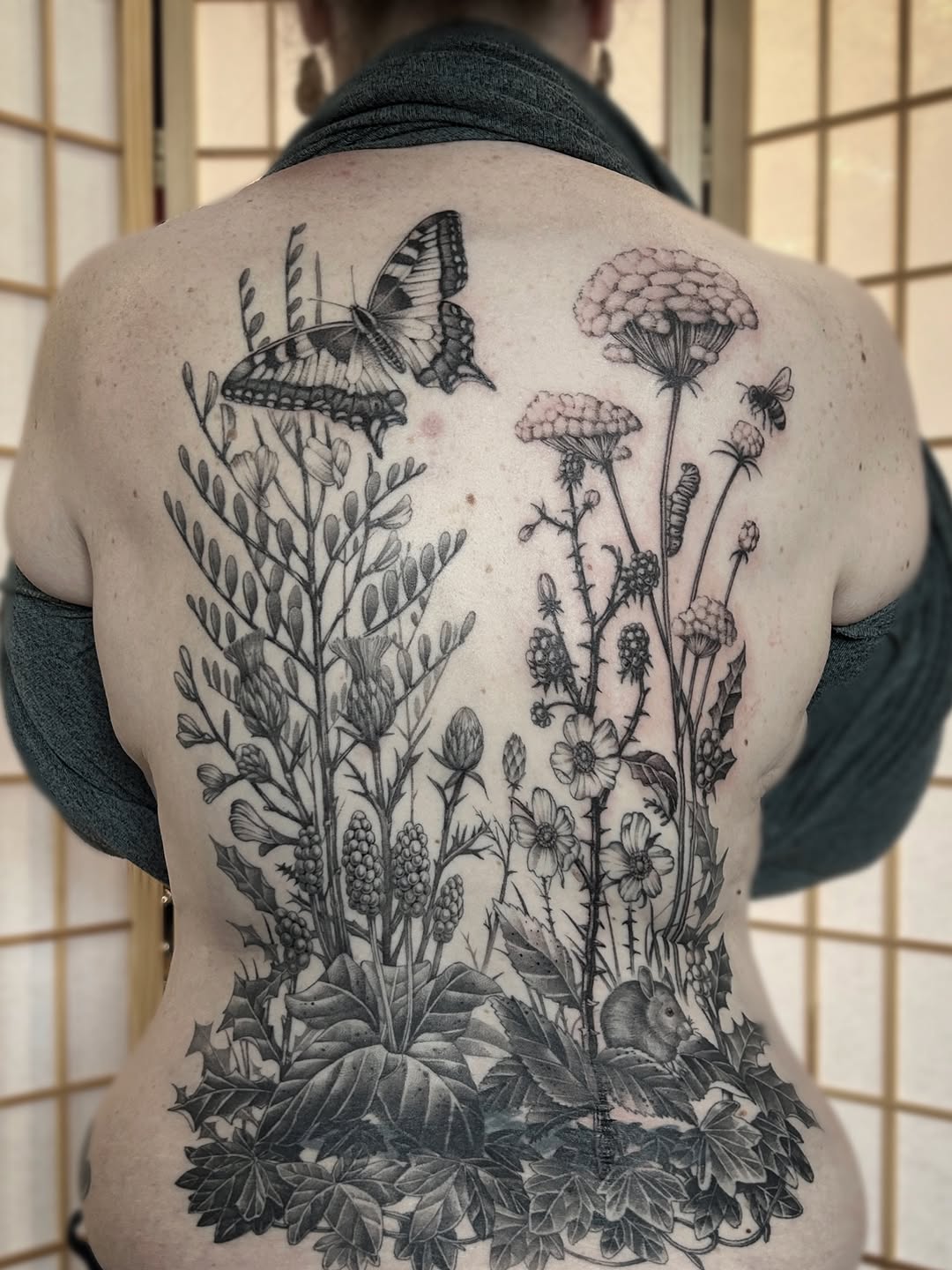 Botanical garden with butterfly and mouse dotwork tattoo on the back by Tako, Seattle, Washington
