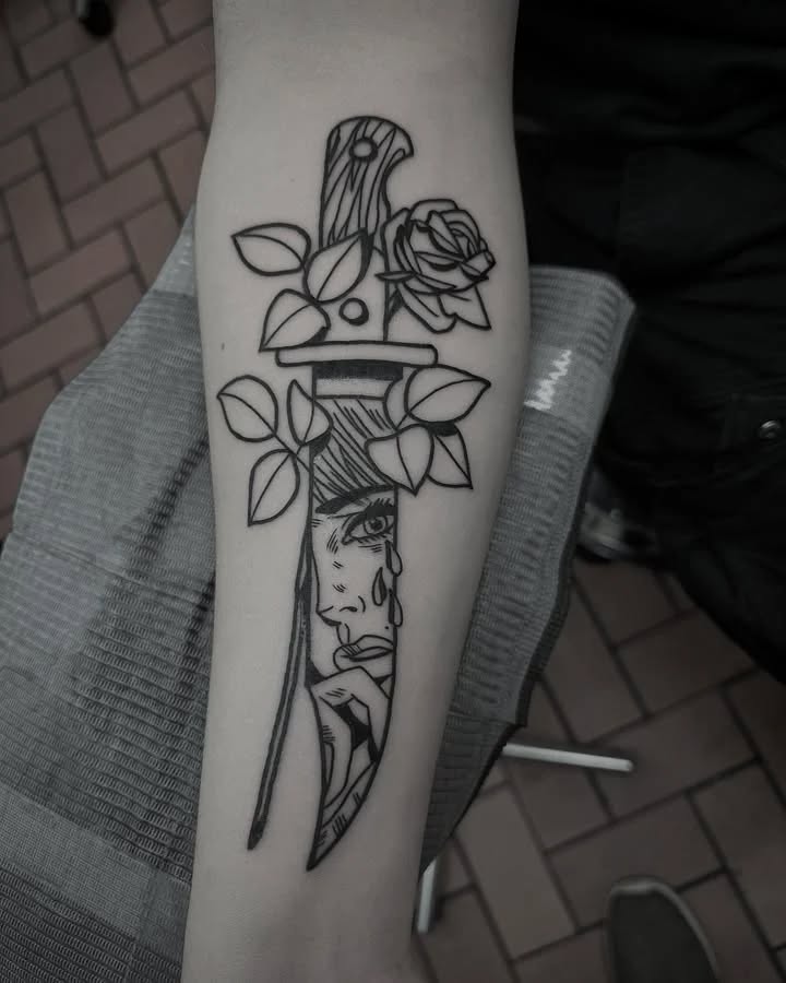 Knife and crying face with rose sketch tattoo on the forearm by Murl Dietrich