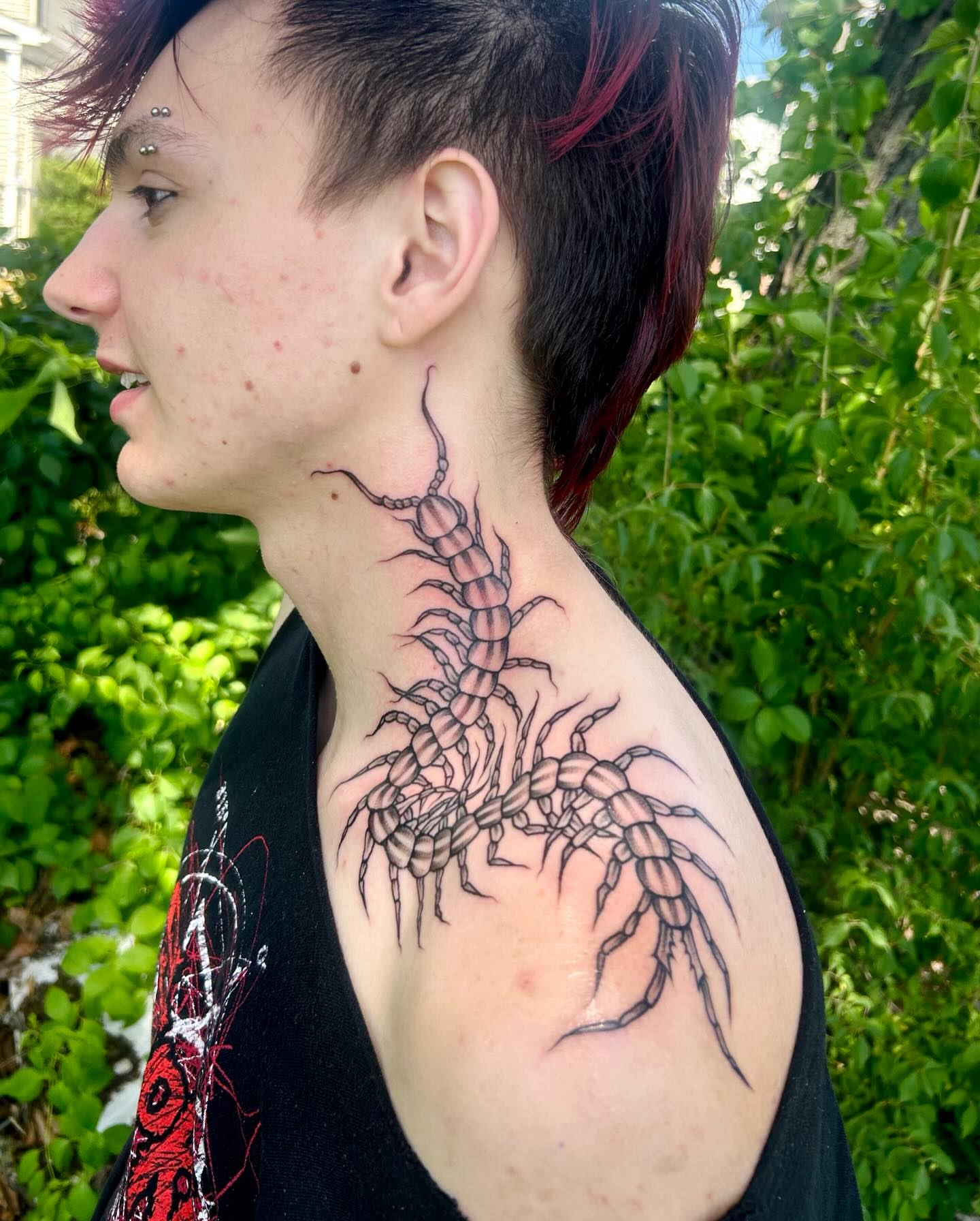 Centipede realism tattoo on the neck by Sarah Miller ✶