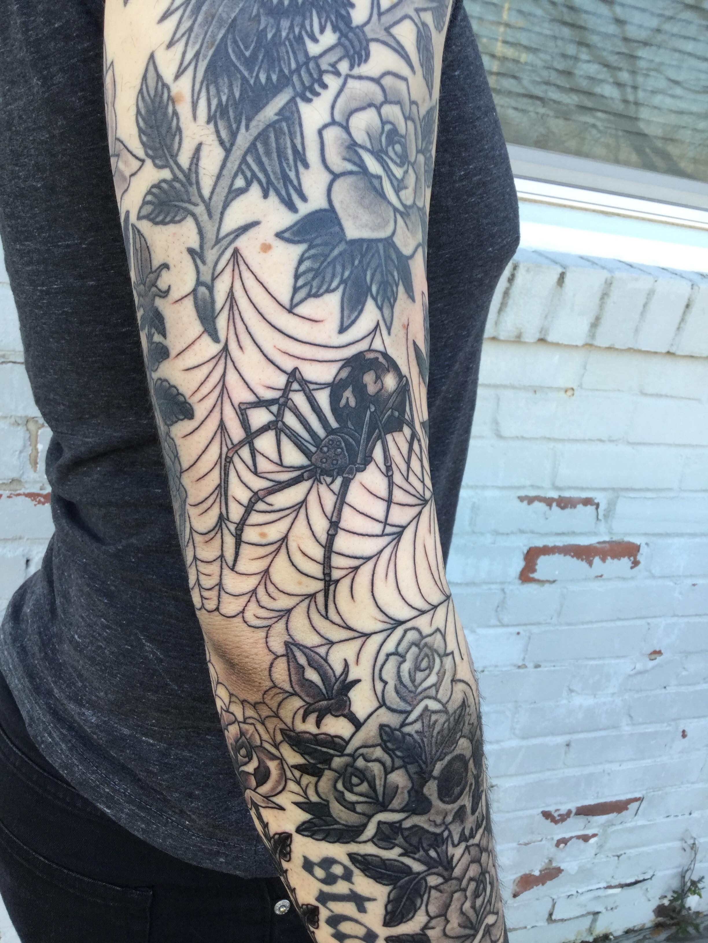 Spider and roses realism tattoo on the forearm by Ravi Chandra, Mount Shasta, California