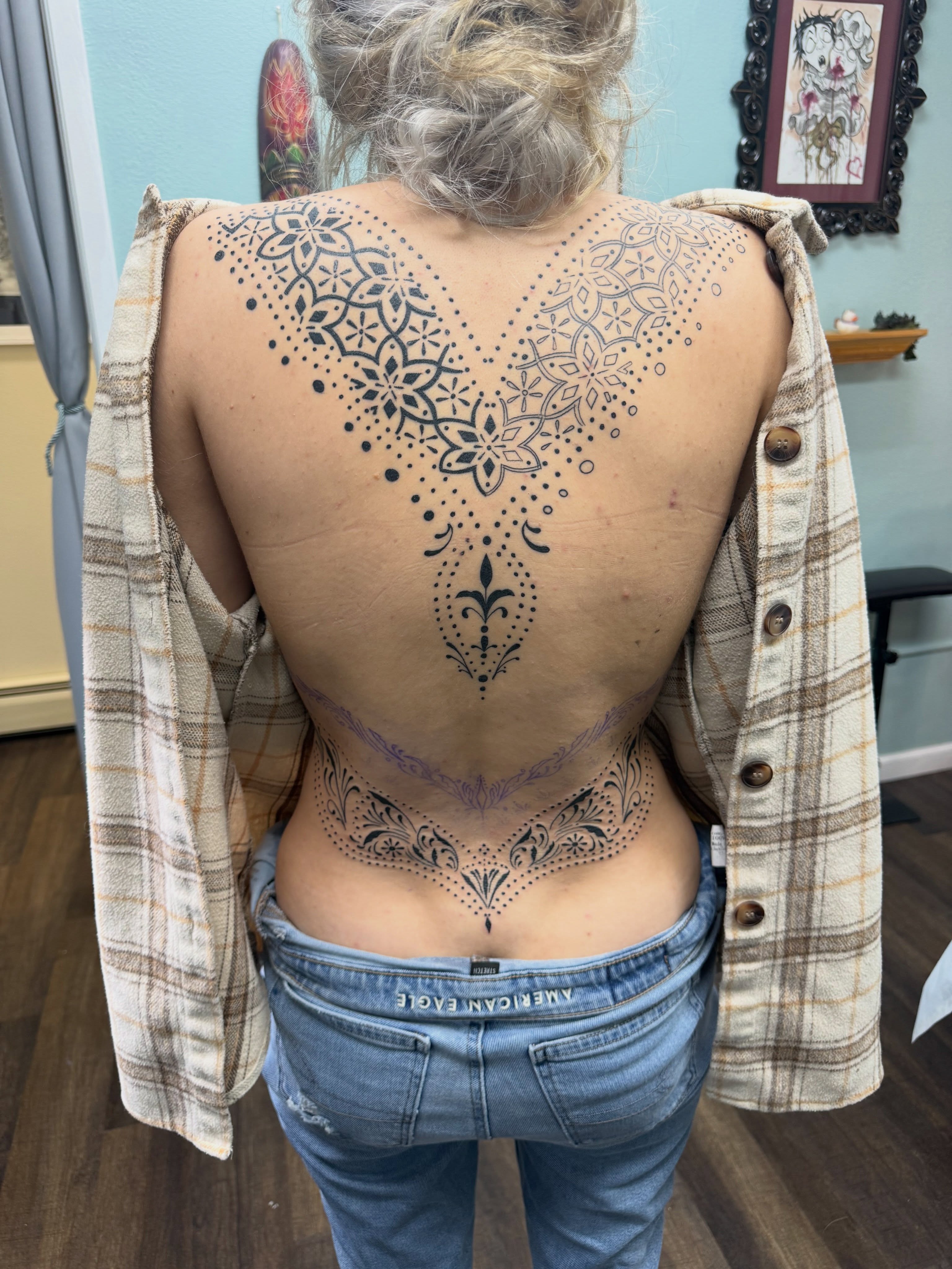 Mandala dotwork tattoo on the back by Michelle Balhan