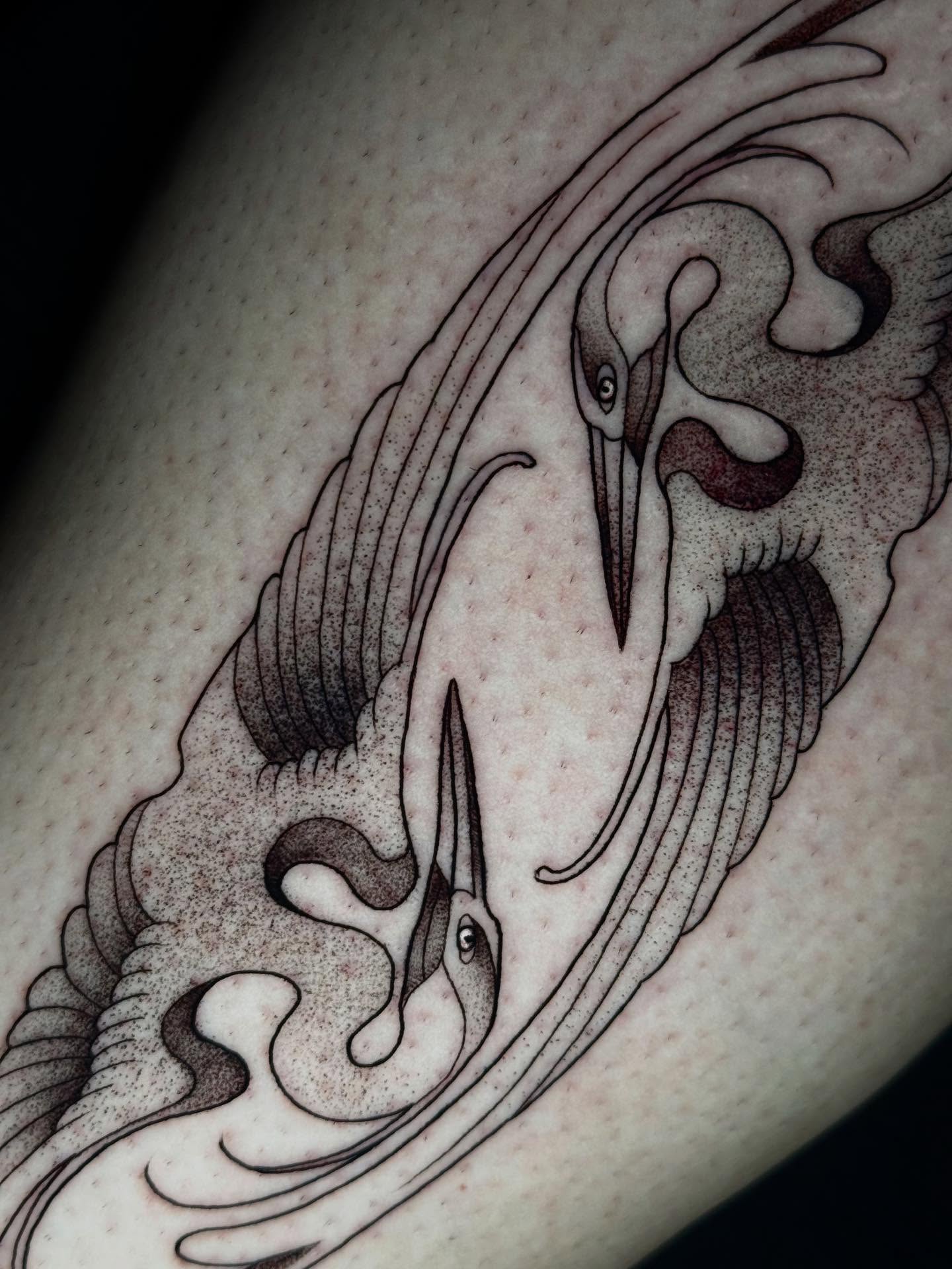 Cranes dotwork tattoo on the forearm by Mads Ink