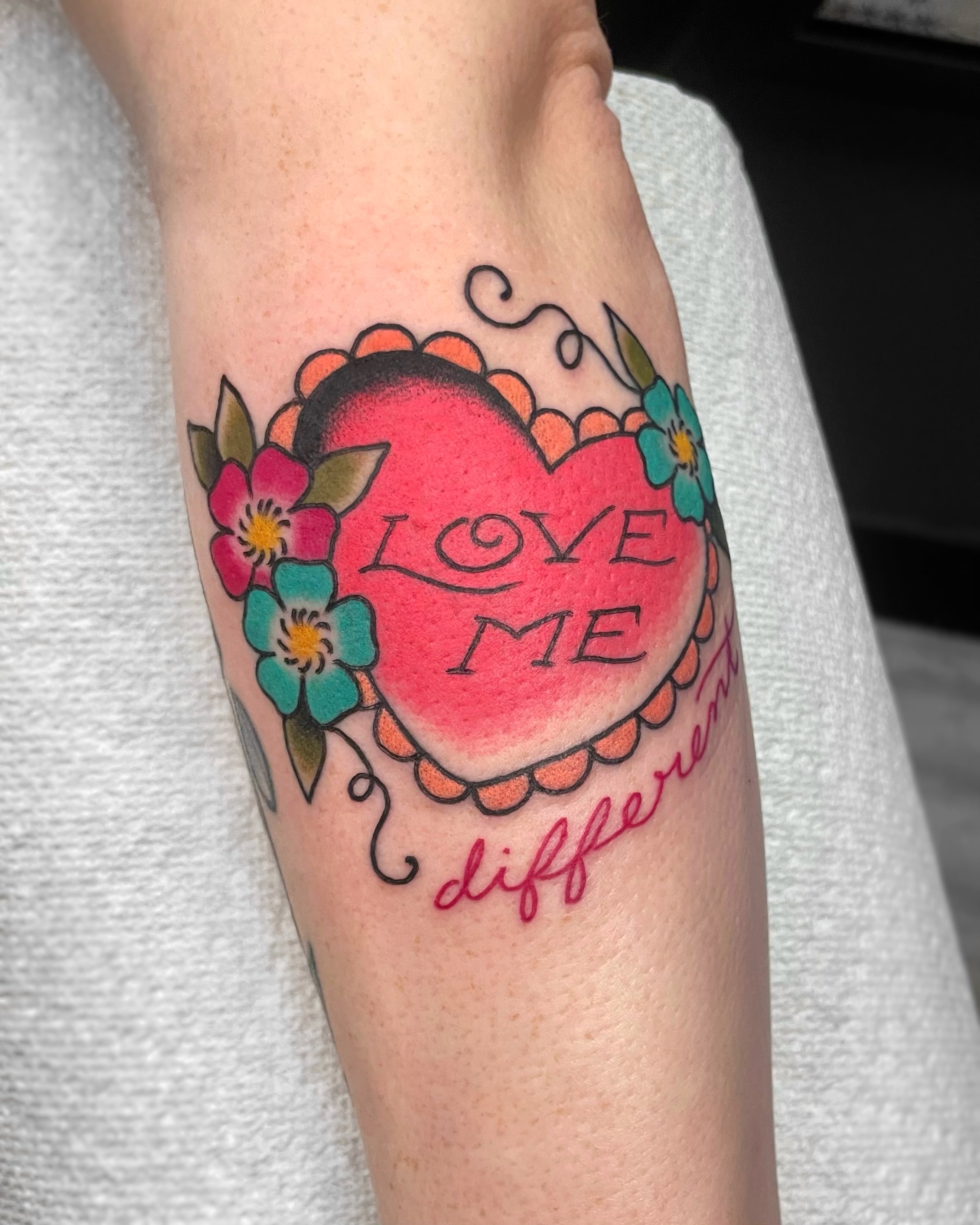 Heart with floral design American traditional tattoo on the forearm by 𝕬𝖓𝖆𝖇𝖊𝖑𝖑 𝕸𝖔𝖗𝖔