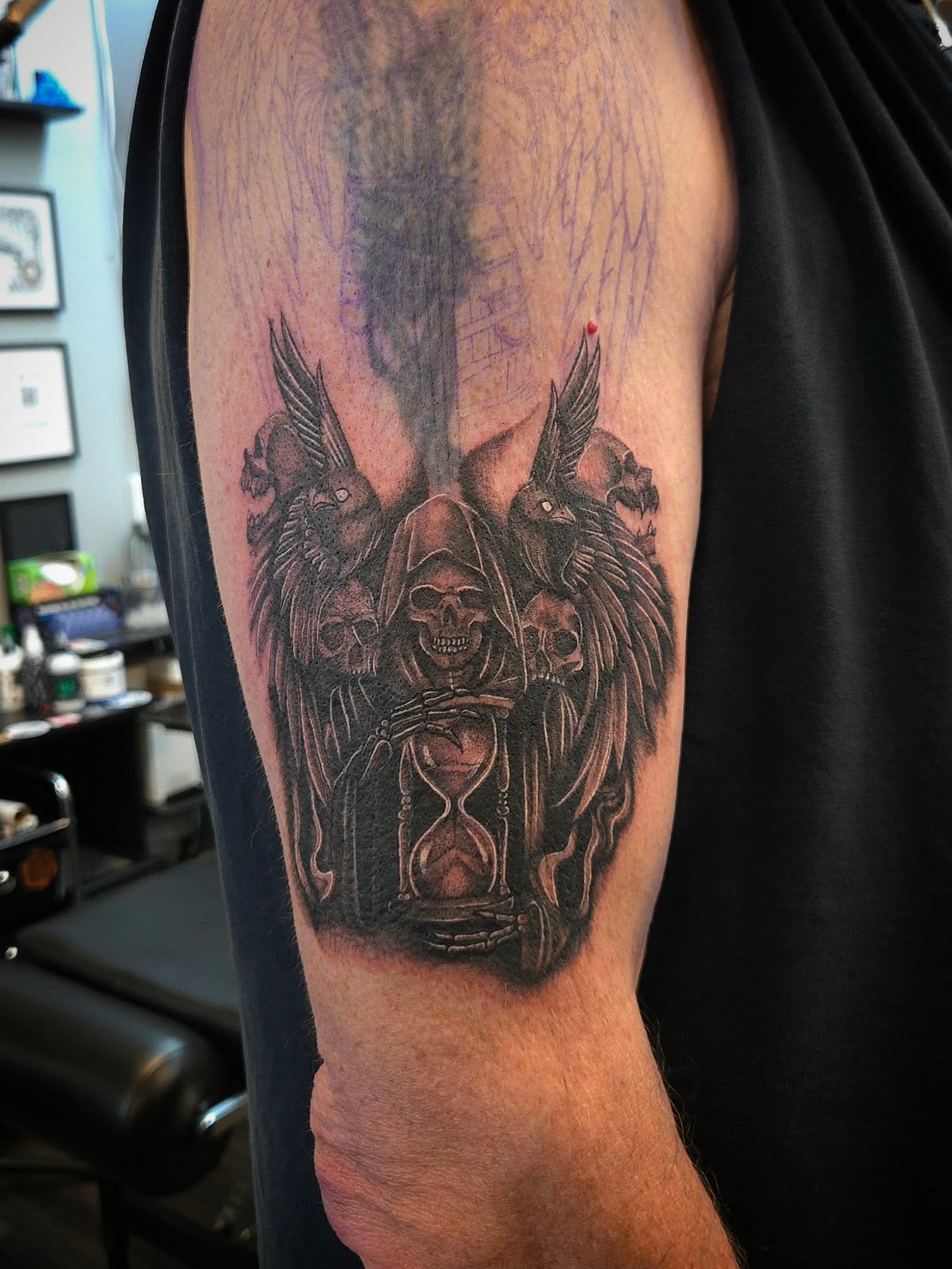 Grim reaper with hourglass realism tattoo on the forearm by Danielle Elizabeth