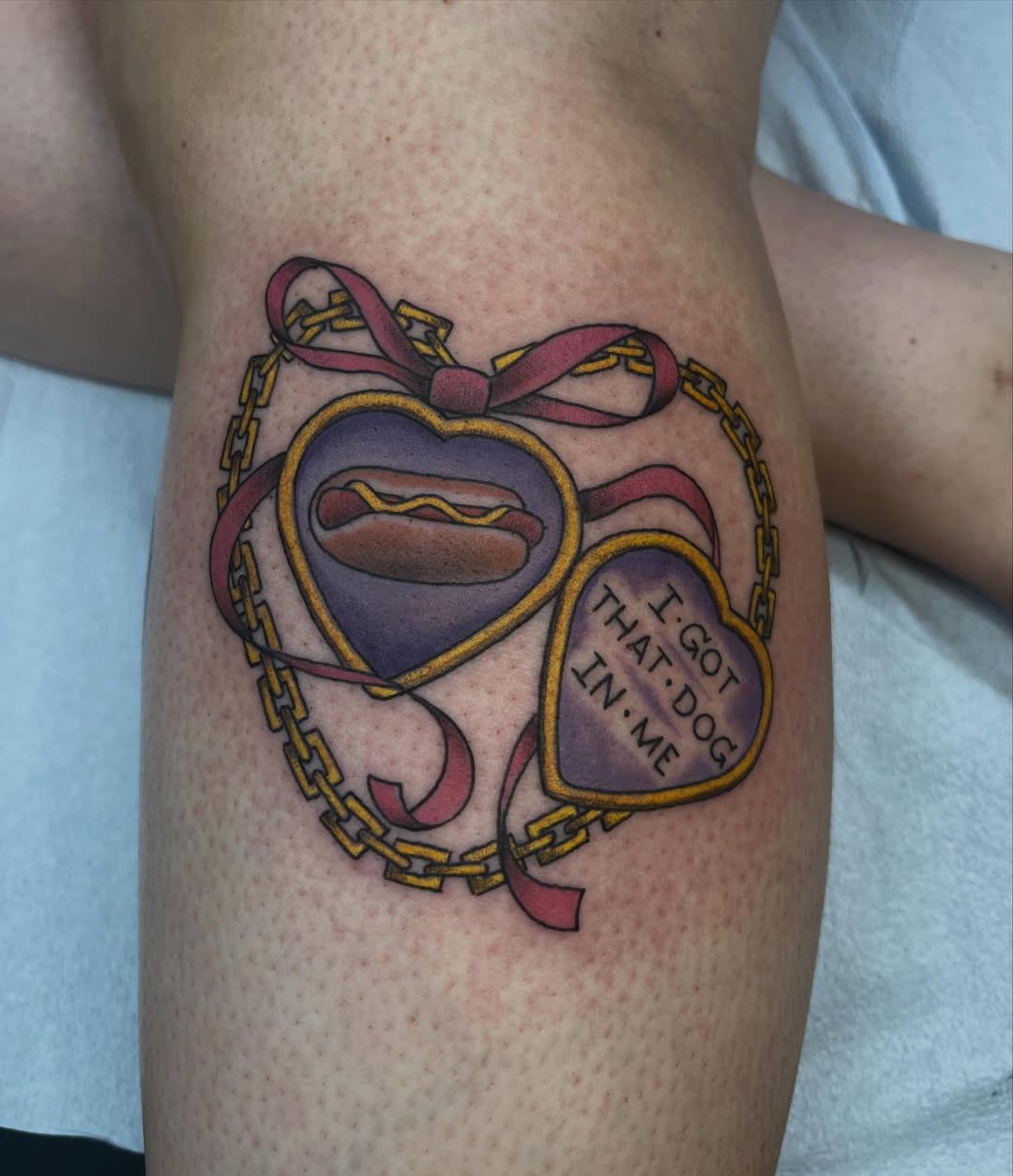 Hot dog in heart American traditional tattoo on the forearm by Brian Mcfadden