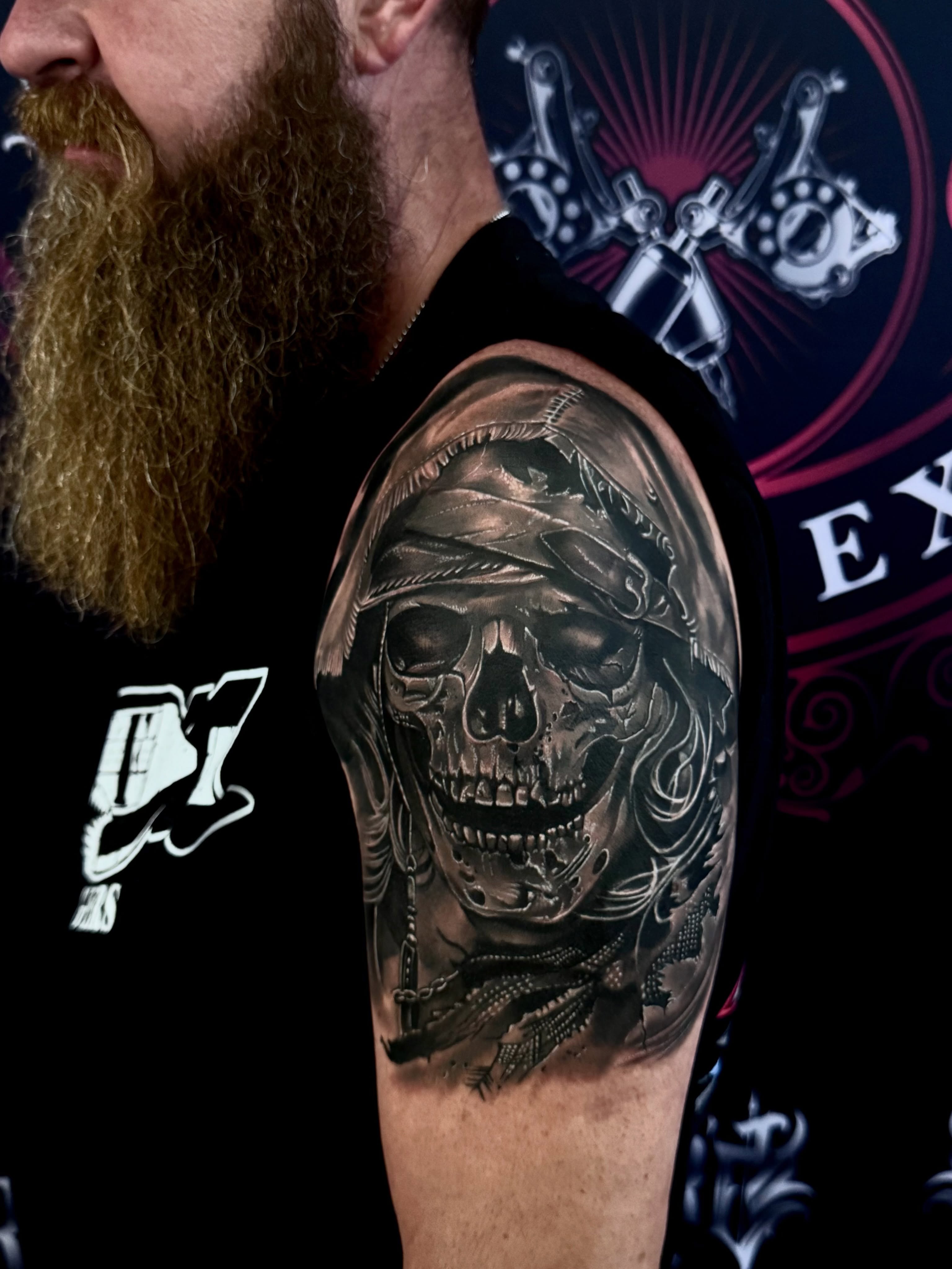 Pirate skull realism tattoo on the shoulder by Chris_Tatt2_D’Ascenzo