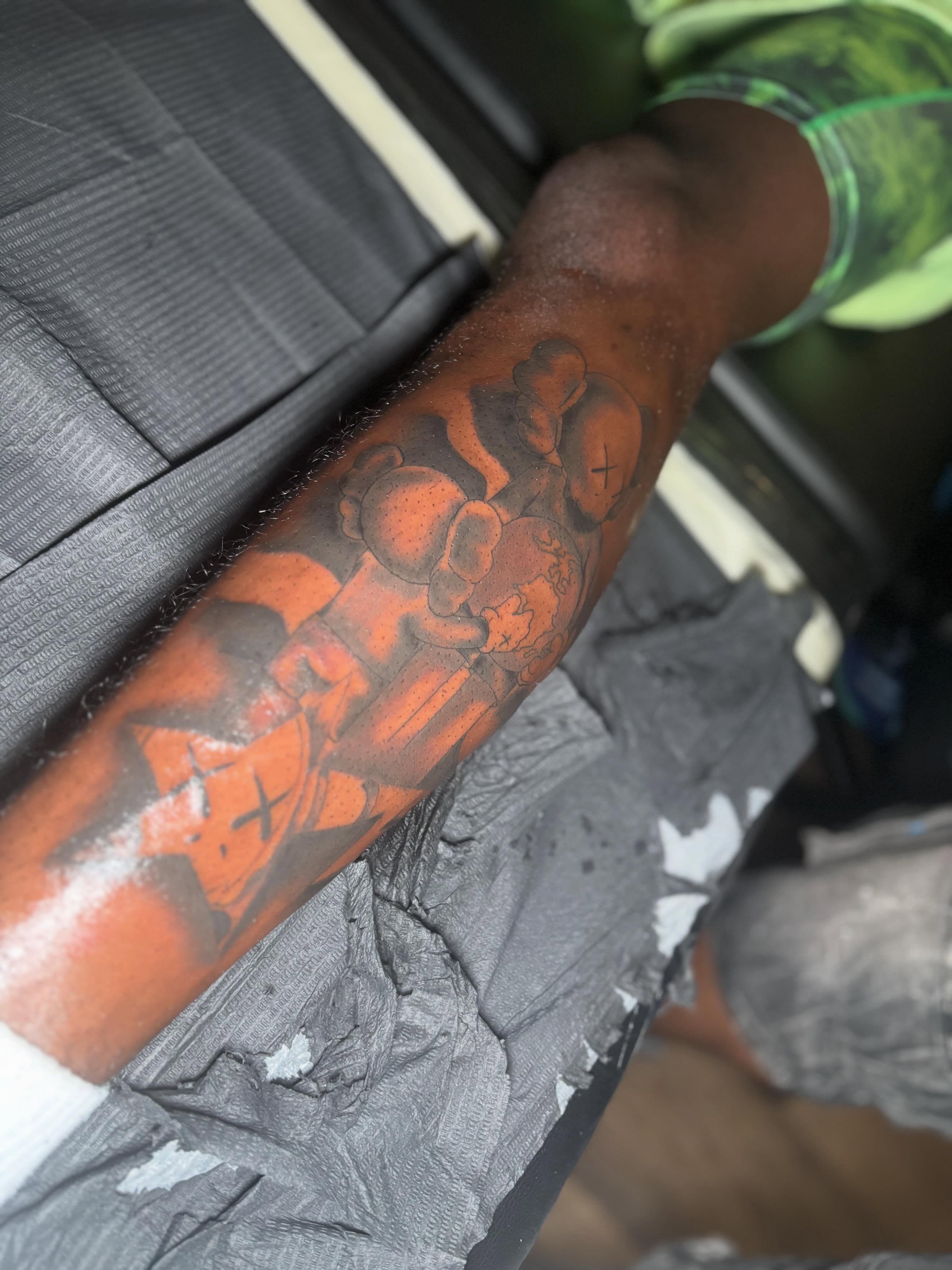 Mario and luigi black and grey tattoo on the forearm by Mr.K